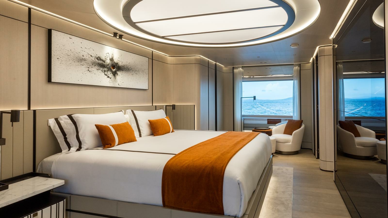 a bed in a room aboard AKULA Yacht for Charter
