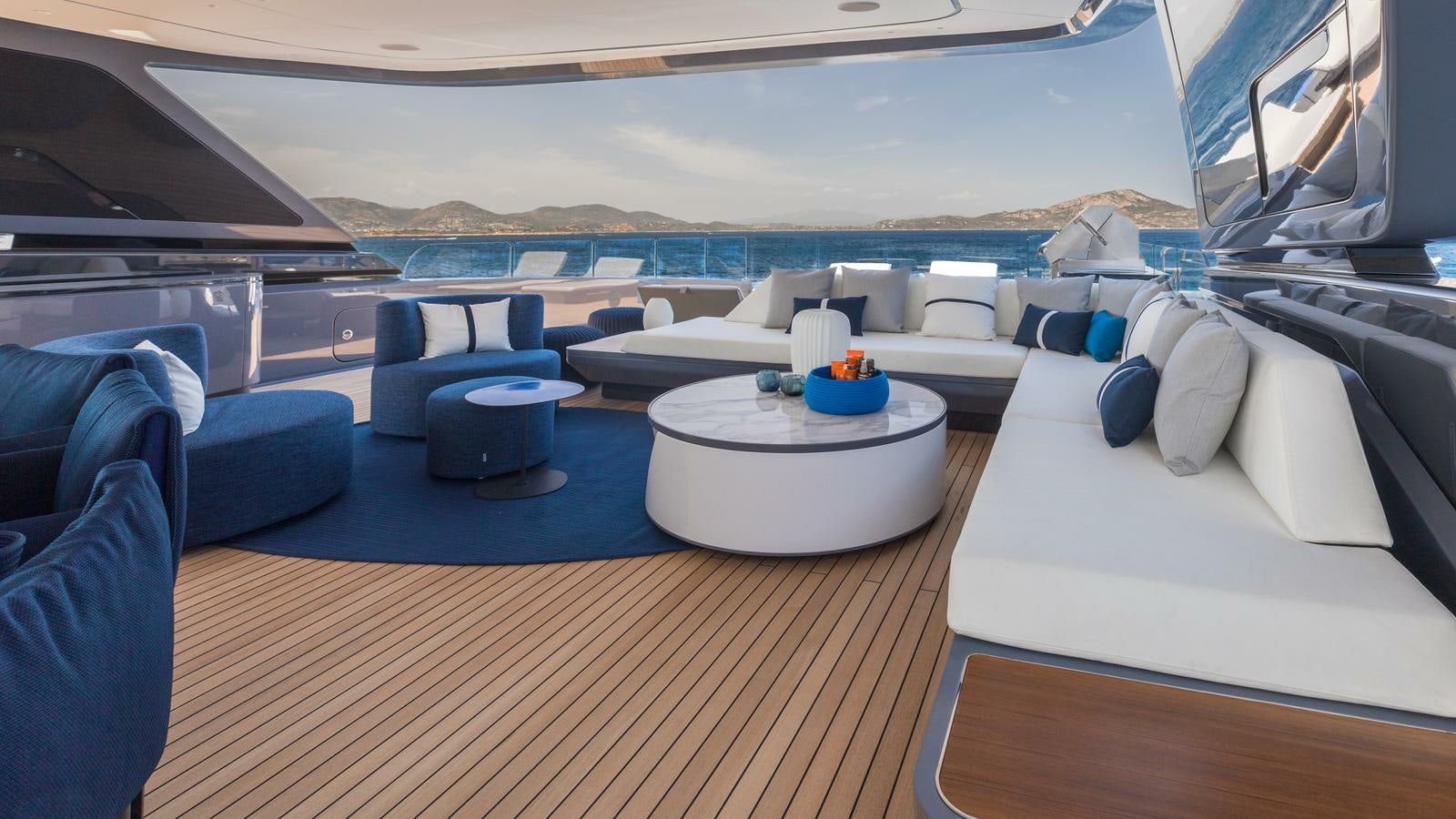 a large lounge area with a pool aboard AKULA Yacht for Charter
