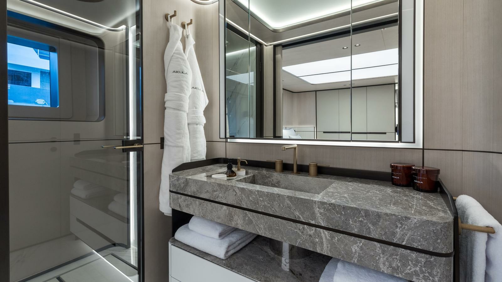 a bathroom with a large countertop aboard AKULA Yacht for Charter