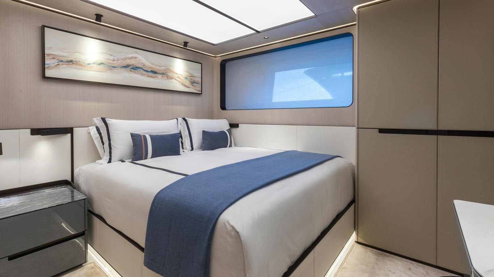 a bed in a room aboard AKULA Yacht for Charter