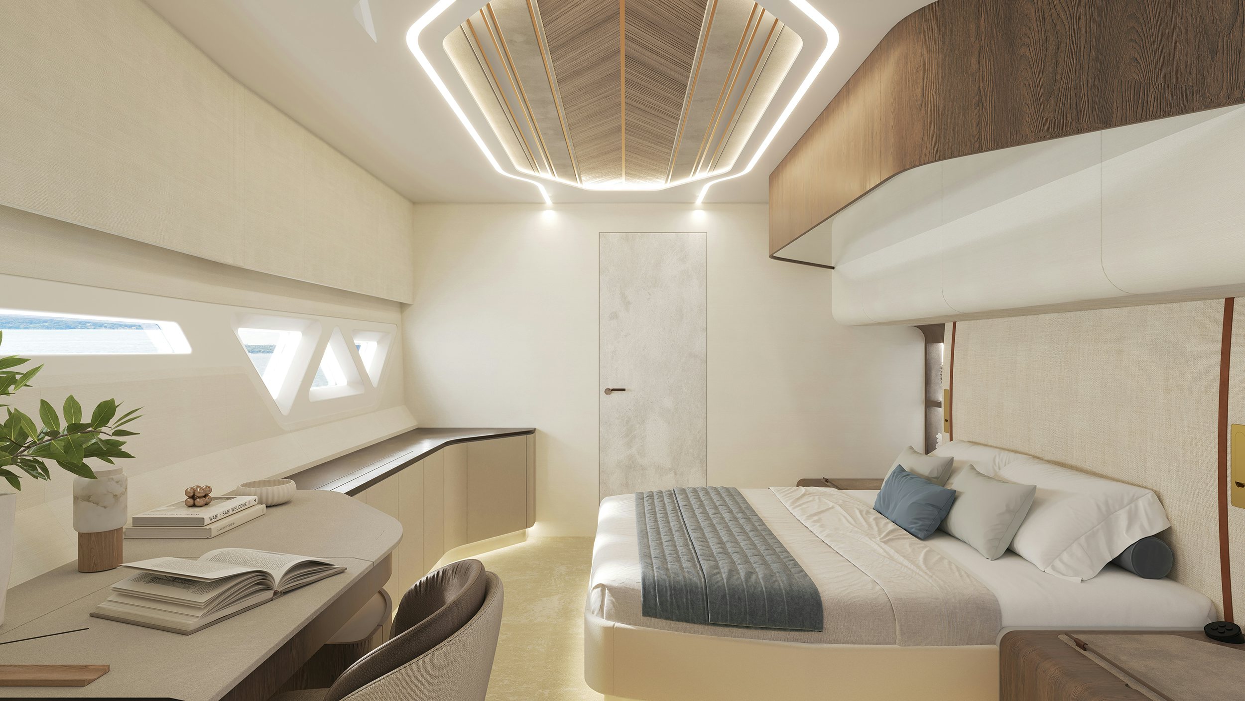 a bedroom with a bed and a desk aboard LANIAKEA Yacht for Sale