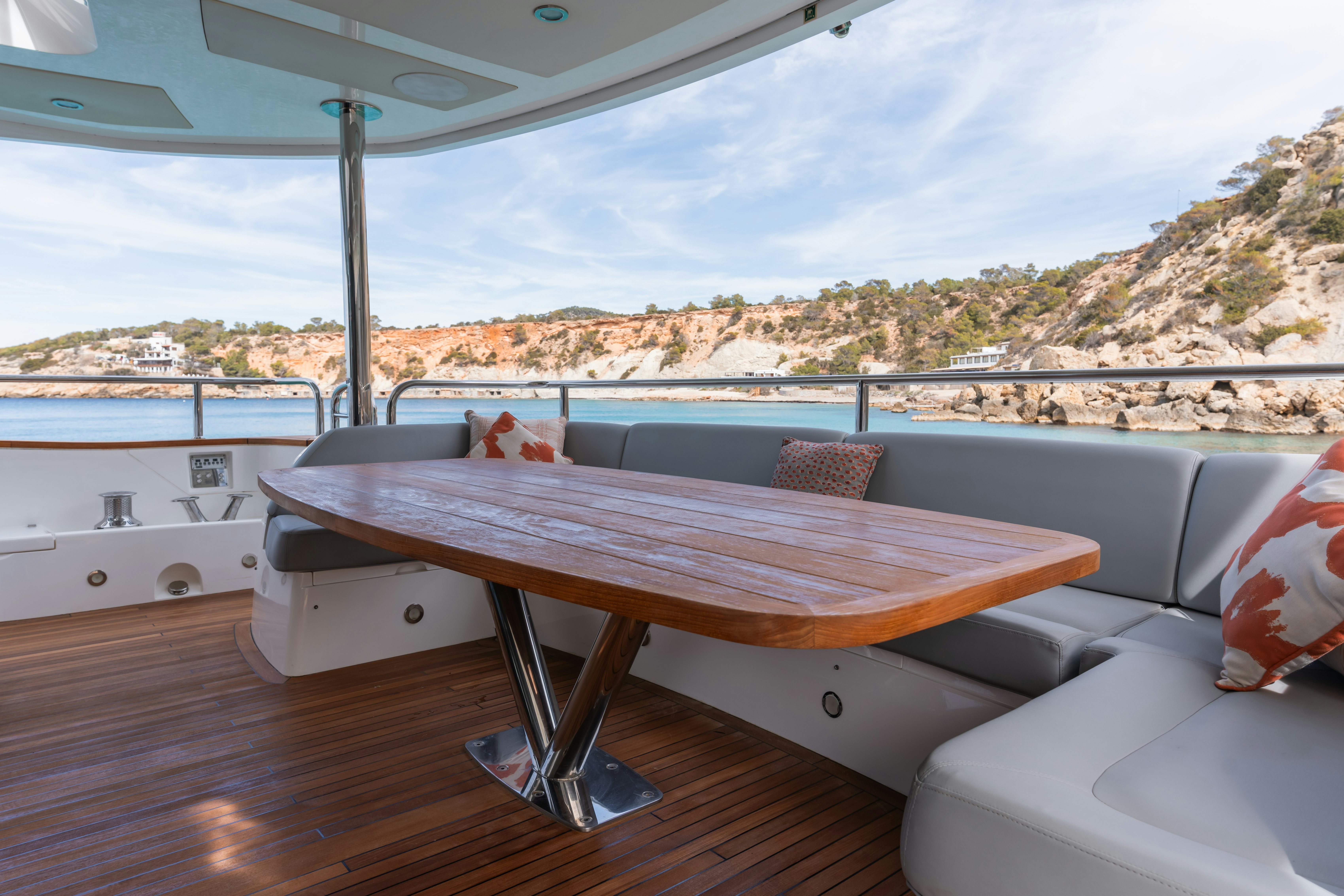 a table on a boat aboard PLAY THE GAME Yacht for Sale