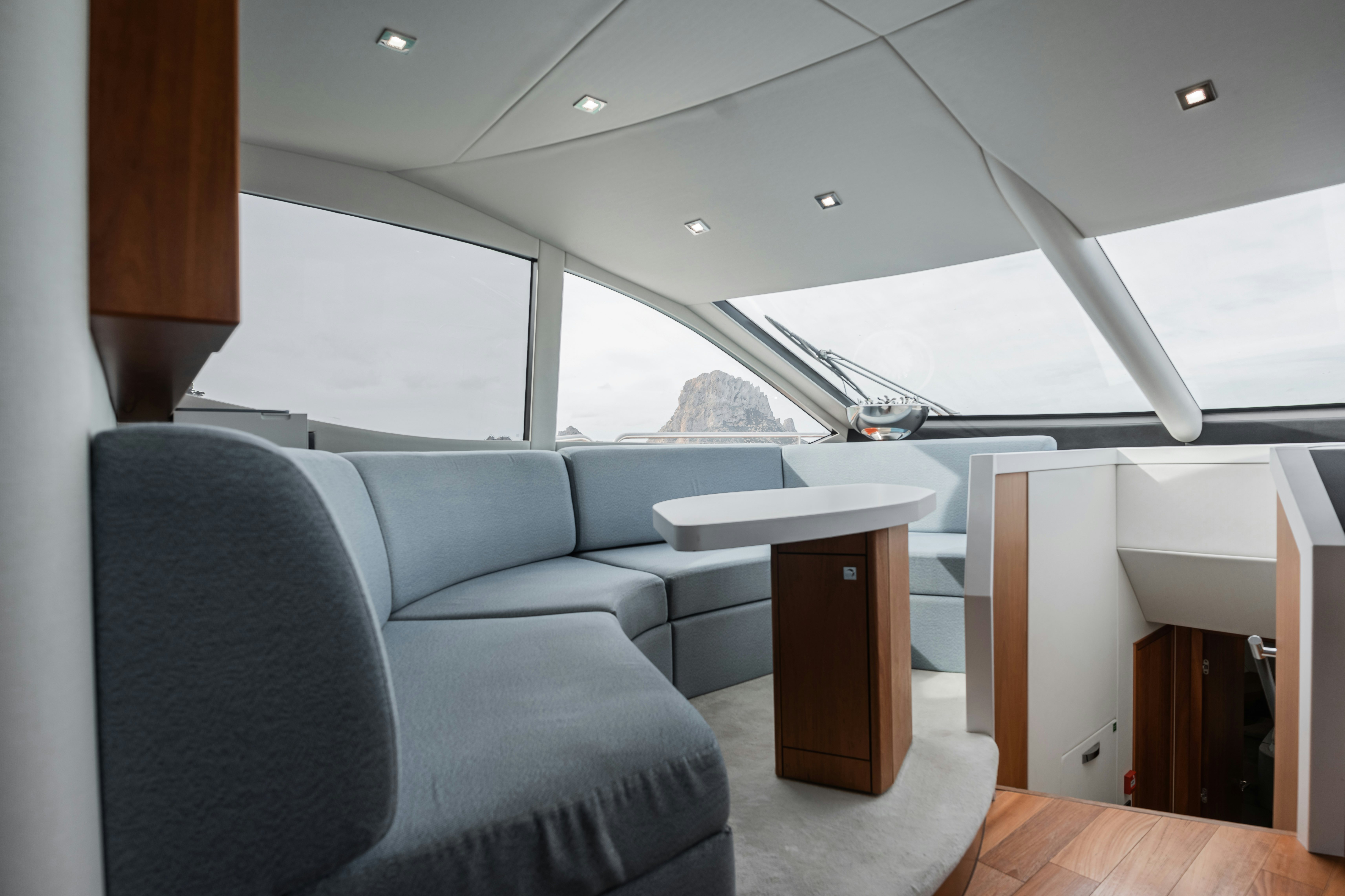 a room with a couch and a table aboard PLAY THE GAME Yacht for Sale