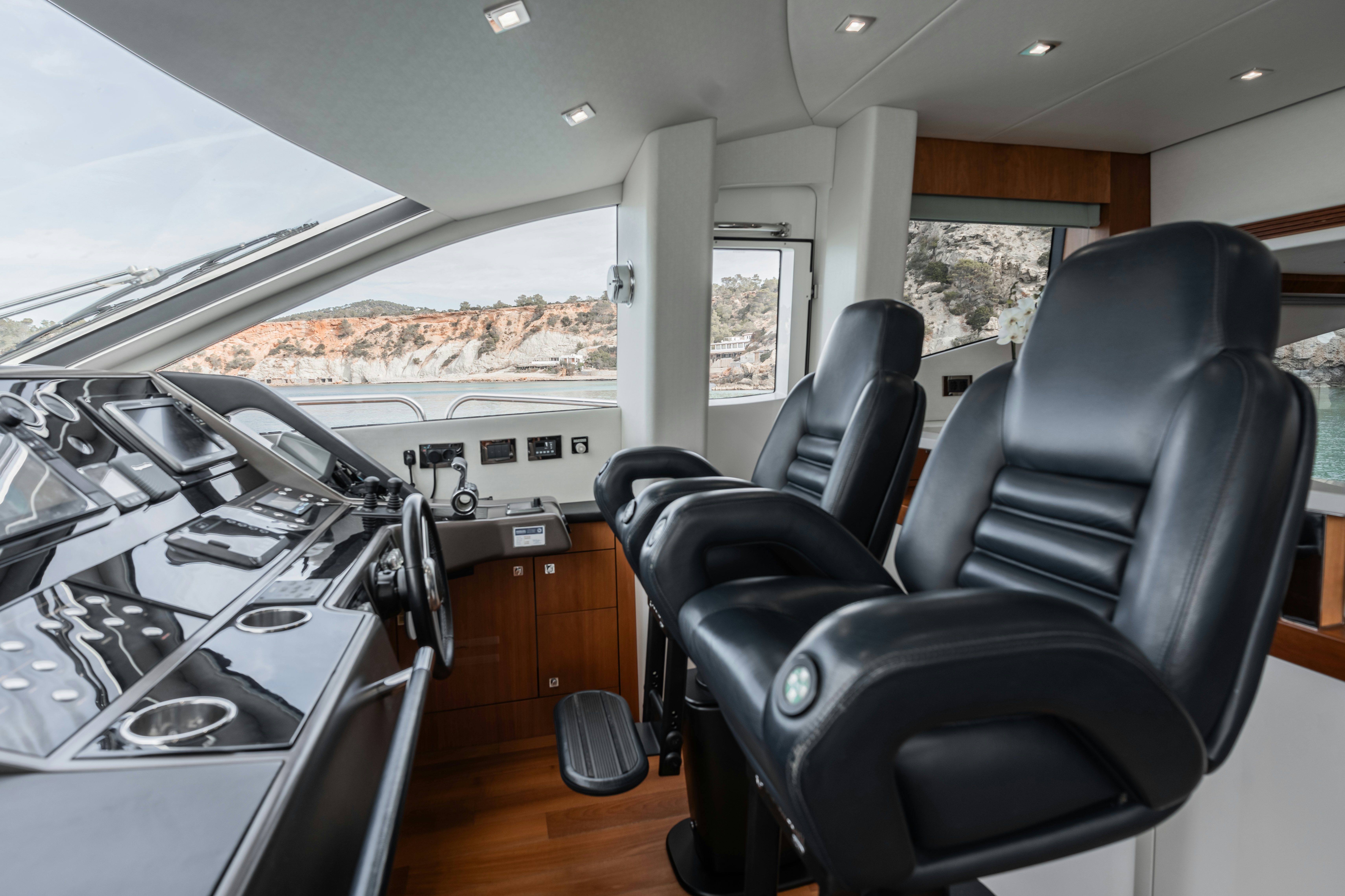 inside of a car aboard PLAY THE GAME Yacht for Sale