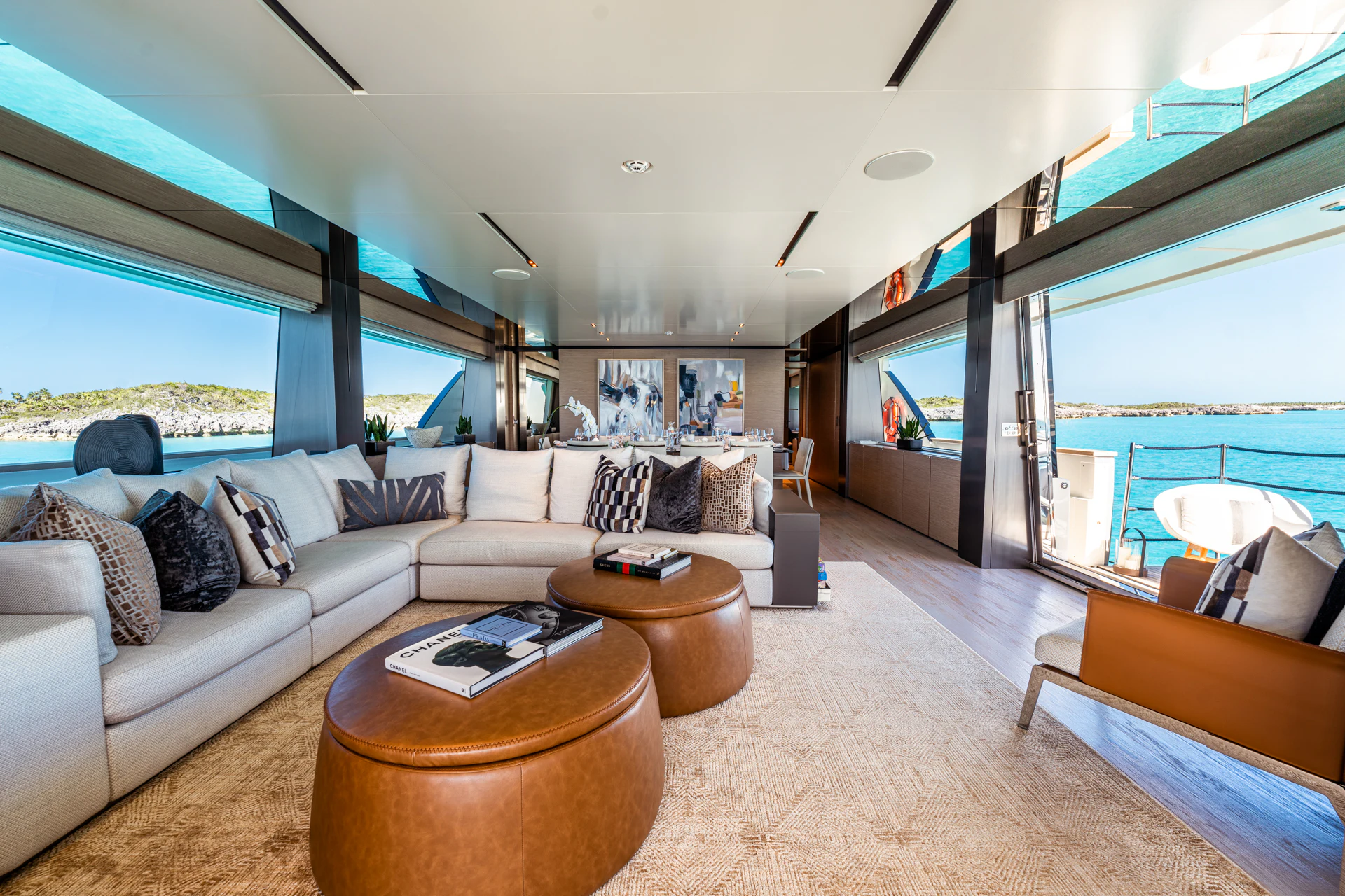a living room with a large window aboard FIFI Yacht for Charter