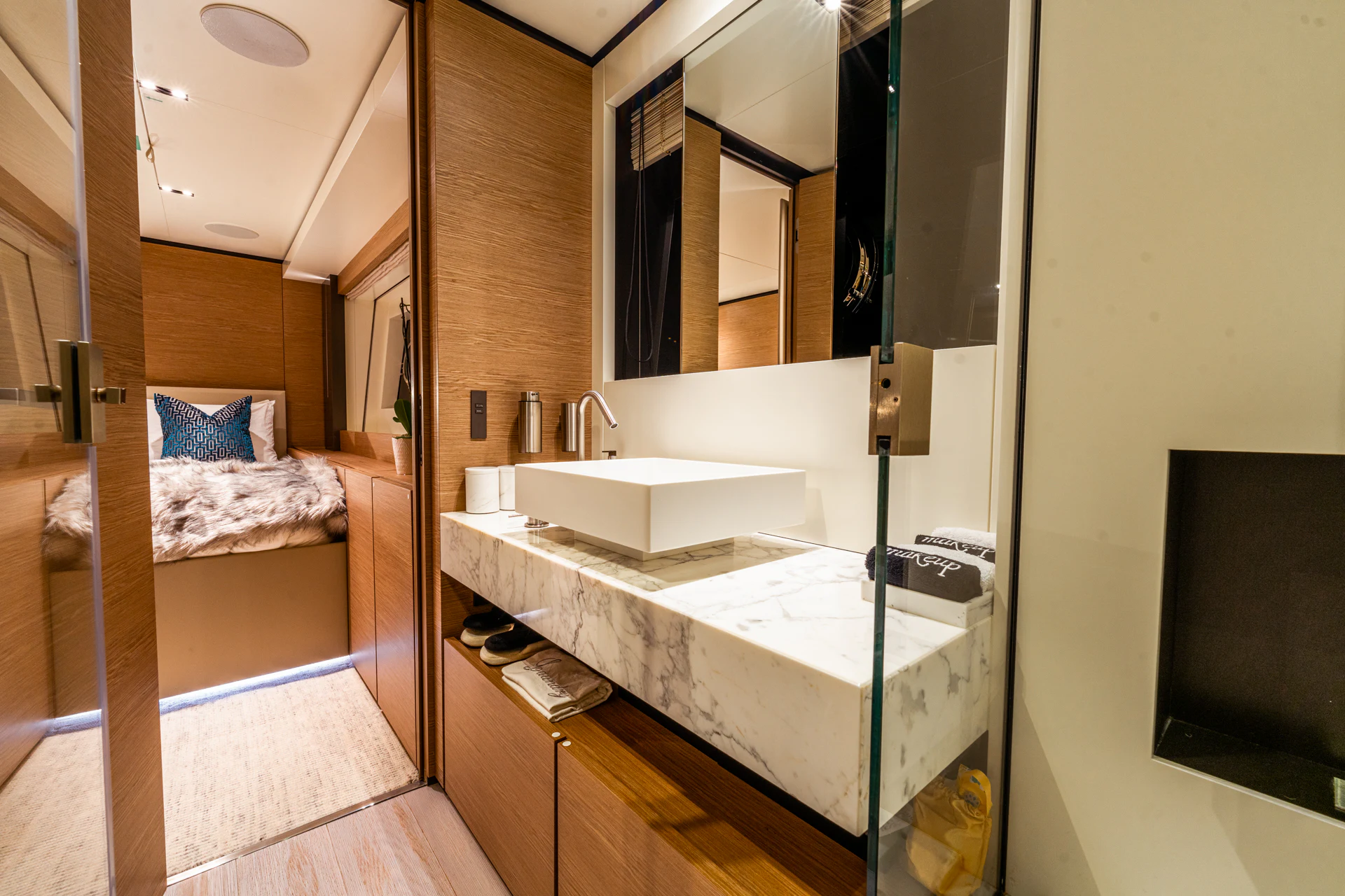 a bathroom with a large mirror aboard FIFI Yacht for Charter