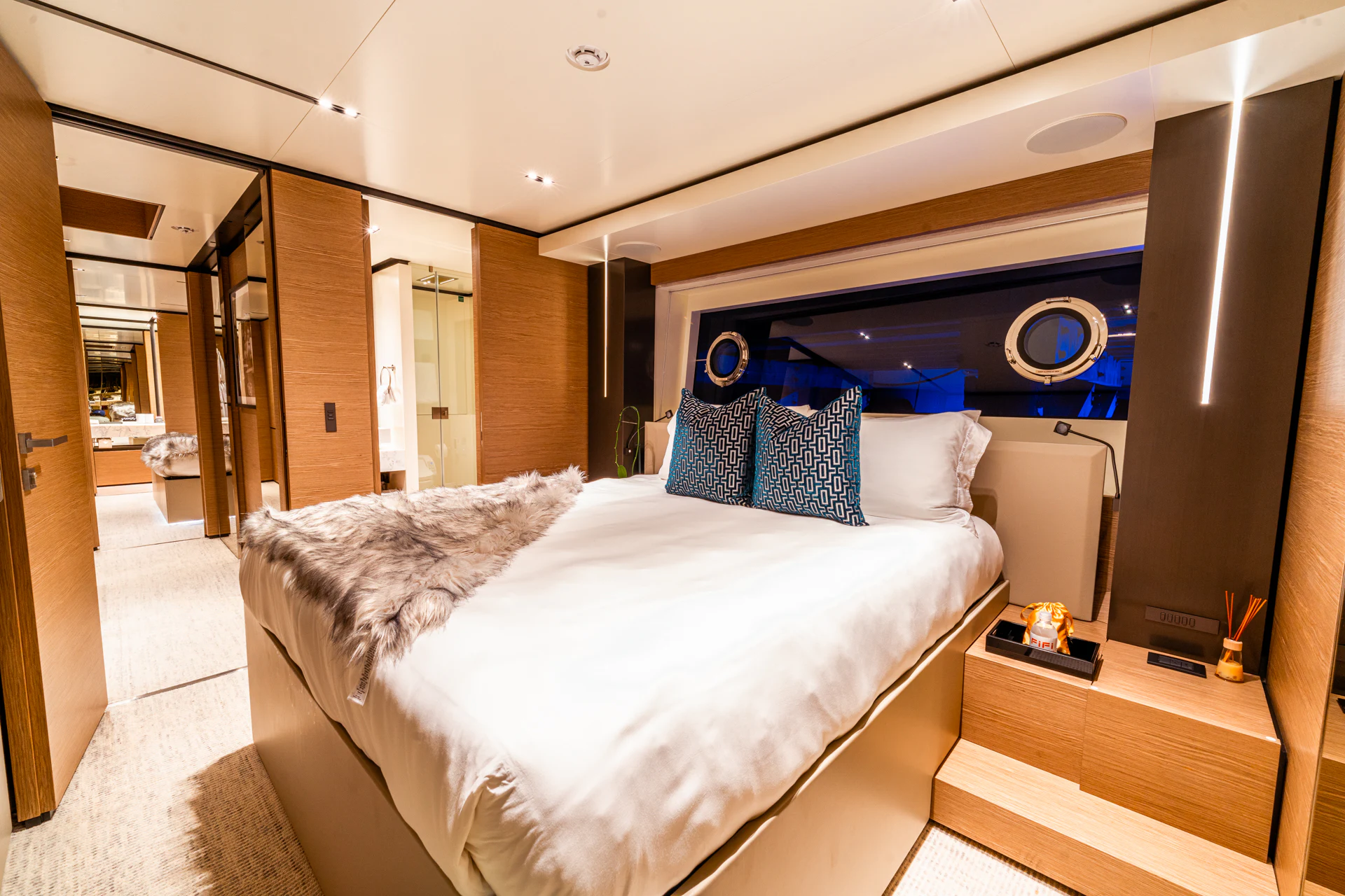 a bedroom with a bed aboard FIFI Yacht for Charter
