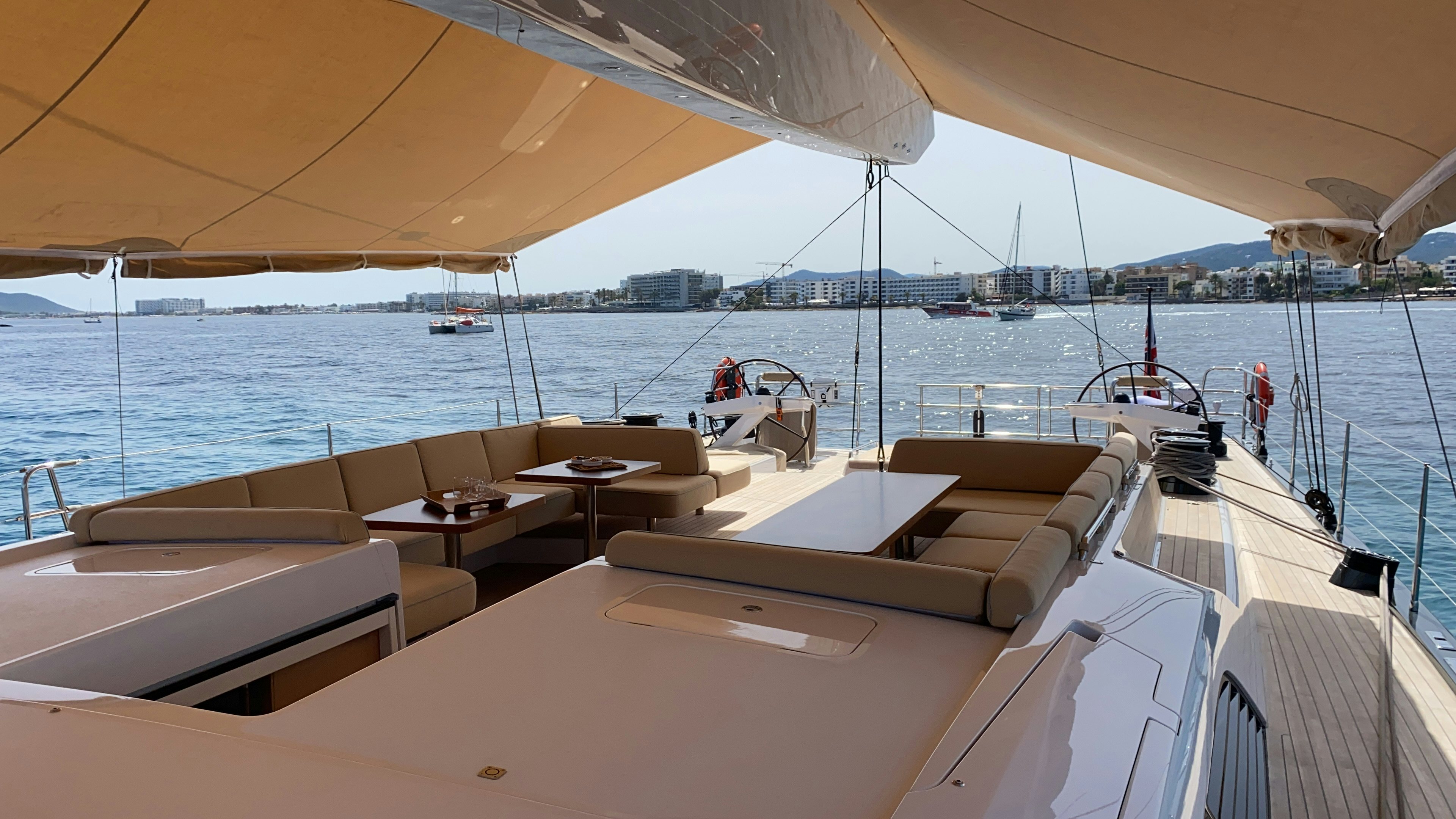 a boat with tables and chairs on it aboard ALIX Yacht for Sale