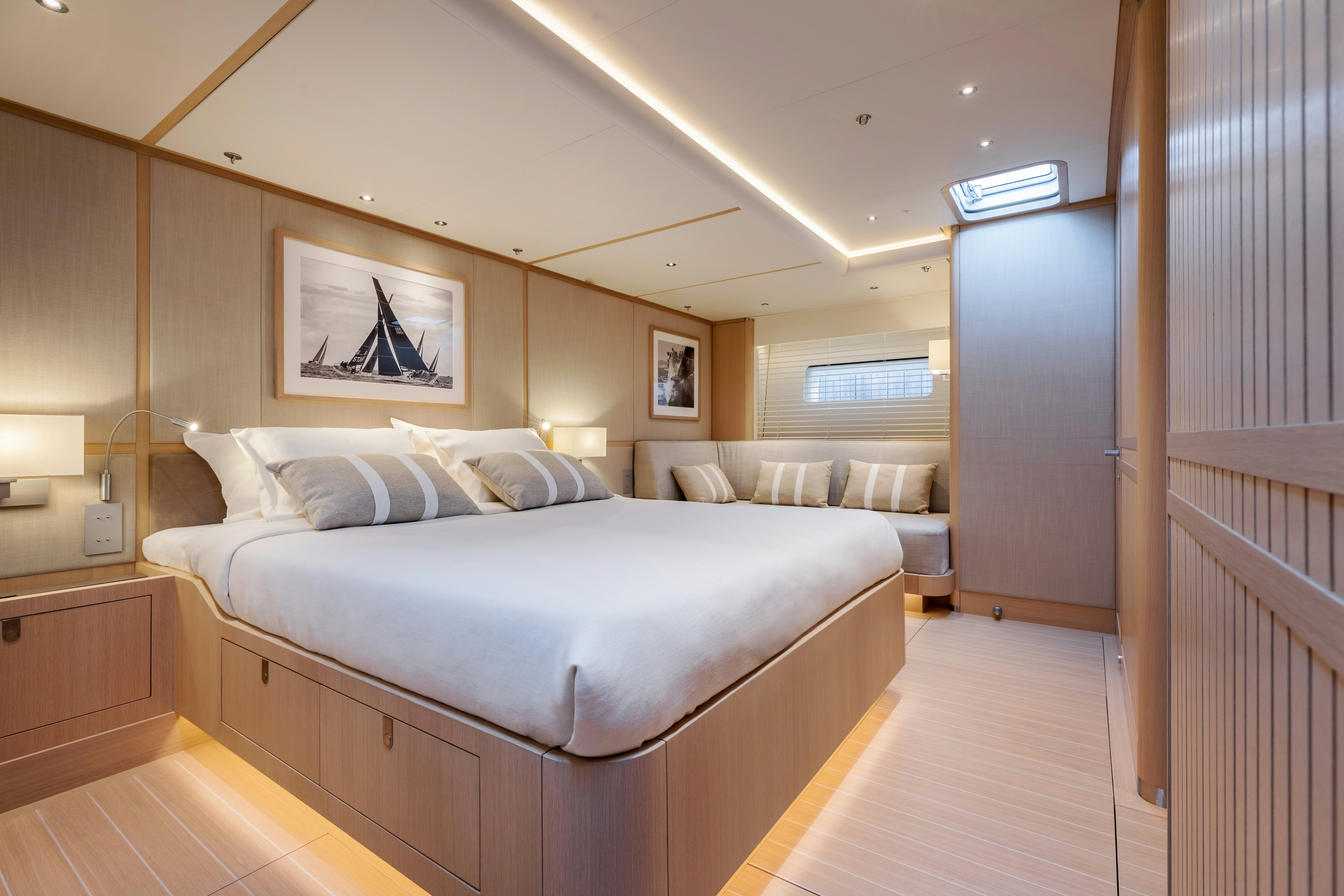 a room with a bed and a couch aboard ALIX Yacht for Sale