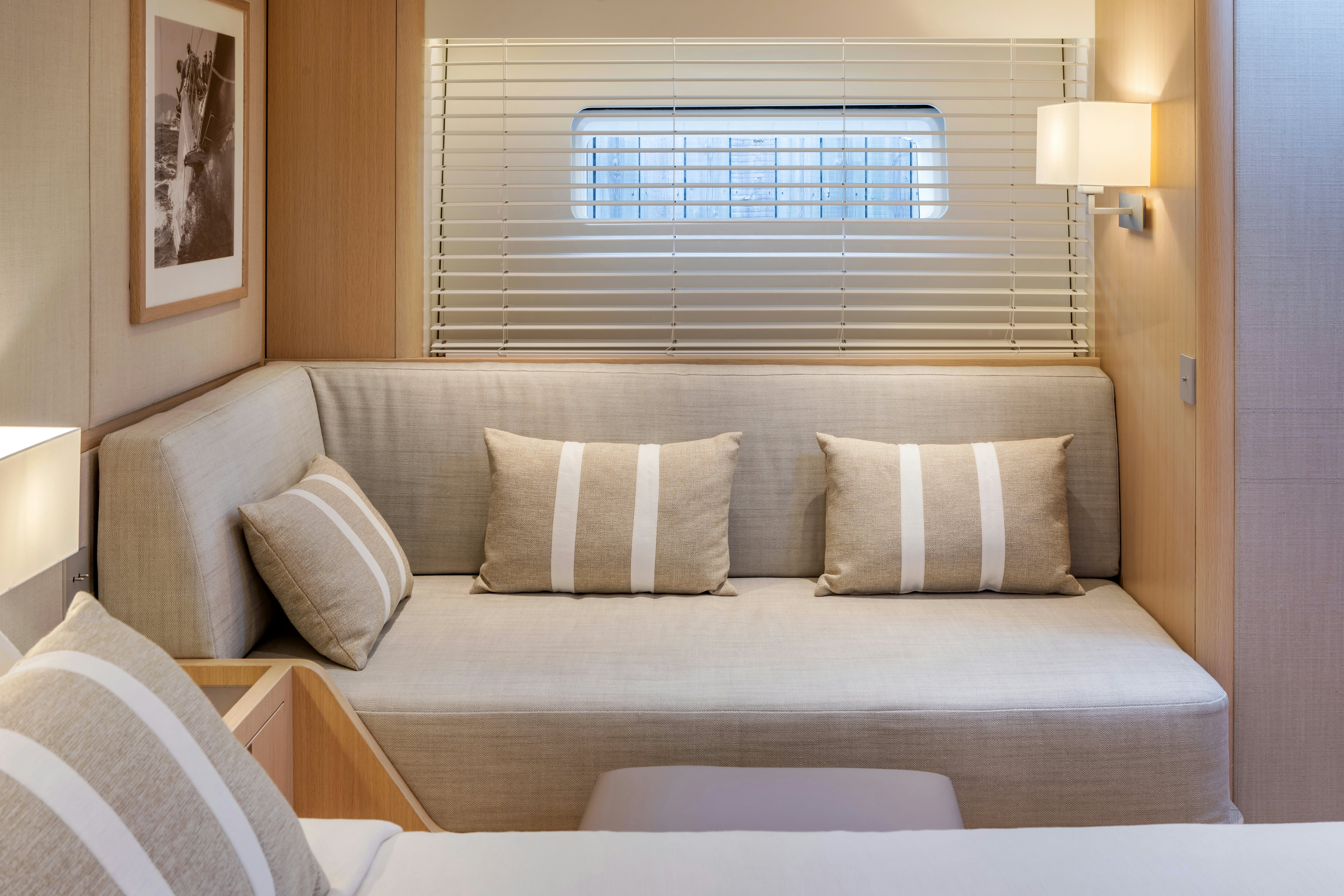 a couch with pillows and pillows aboard ALIX Yacht for Sale