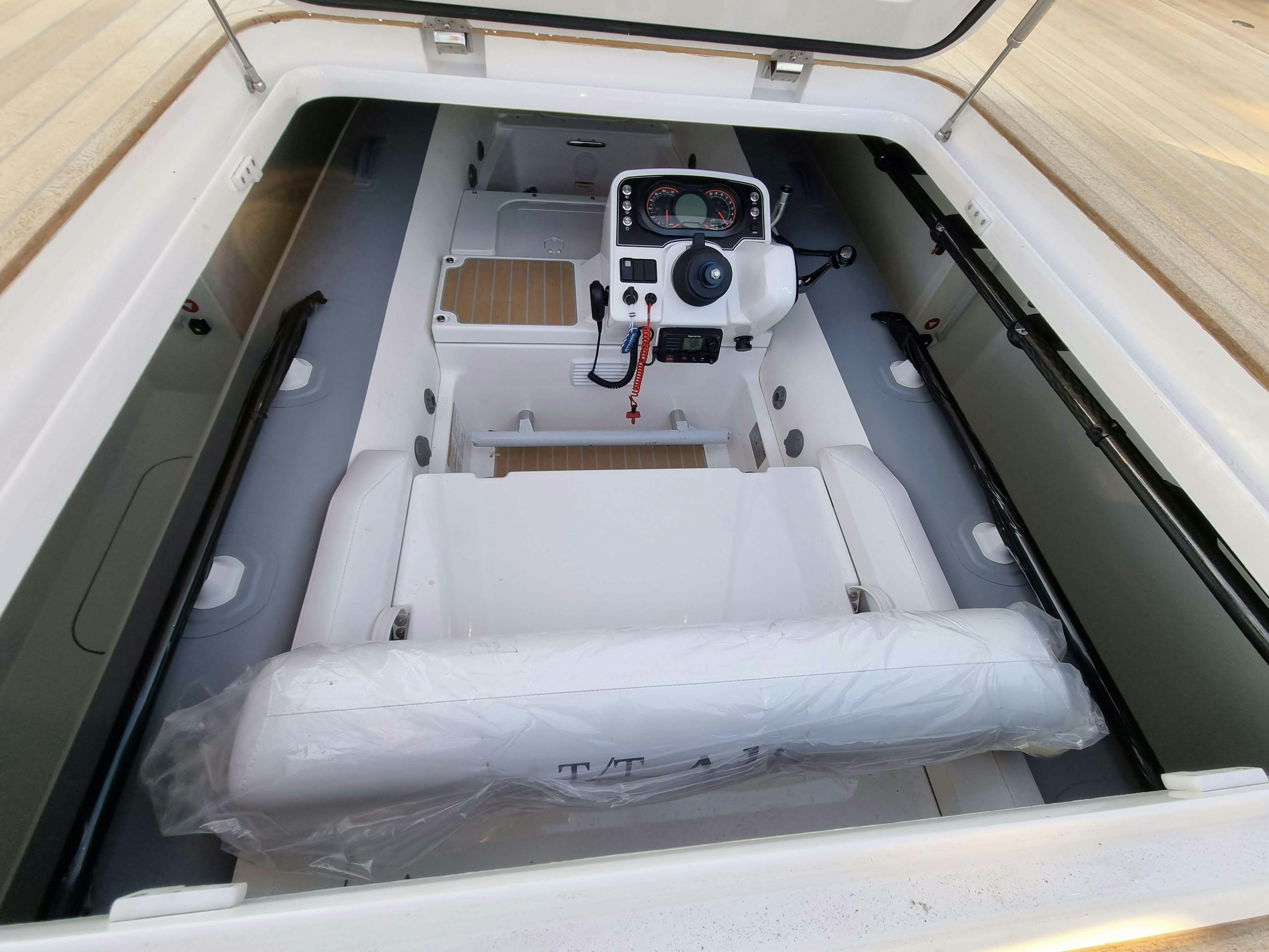 a car with a hood open aboard ALIX Yacht for Sale