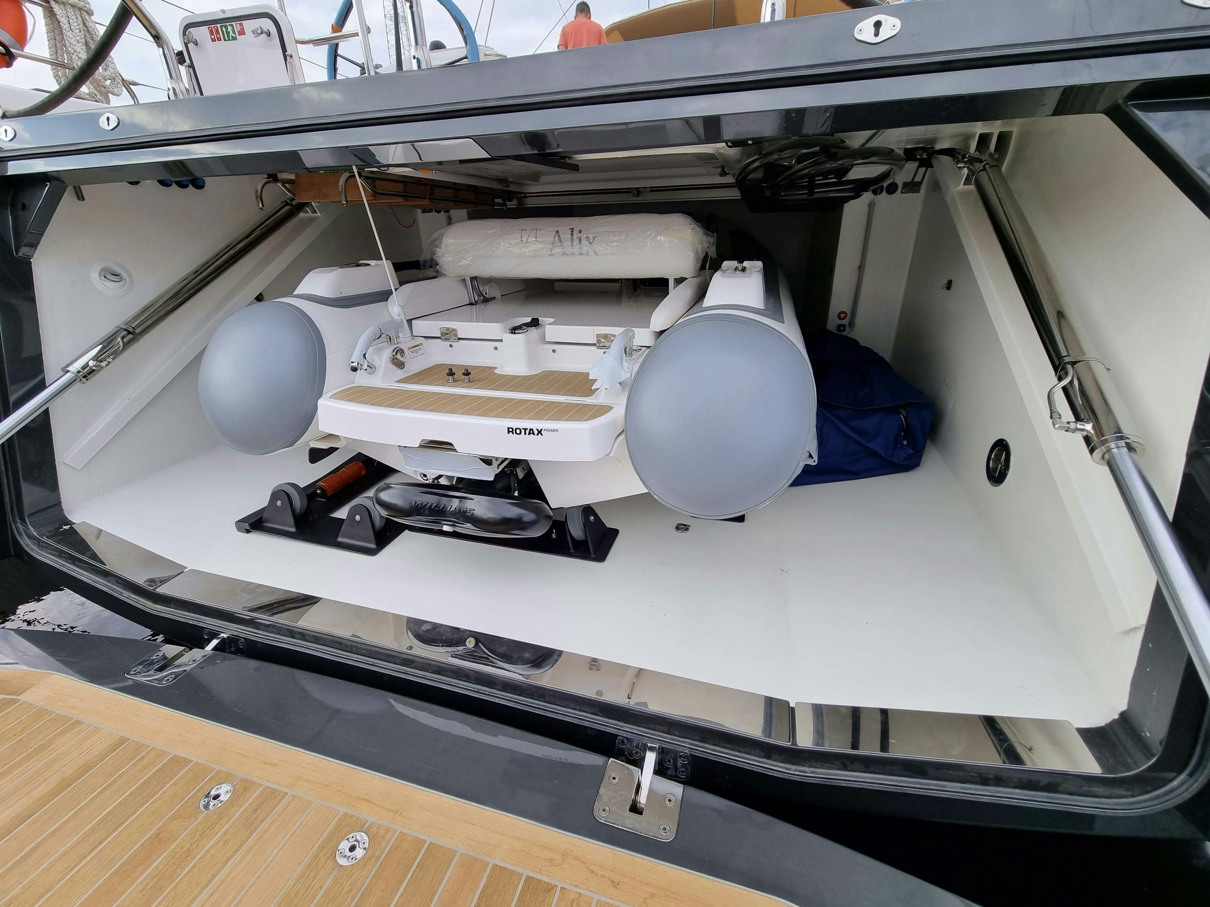 a white machine with a blue bag aboard ALIX Yacht for Sale