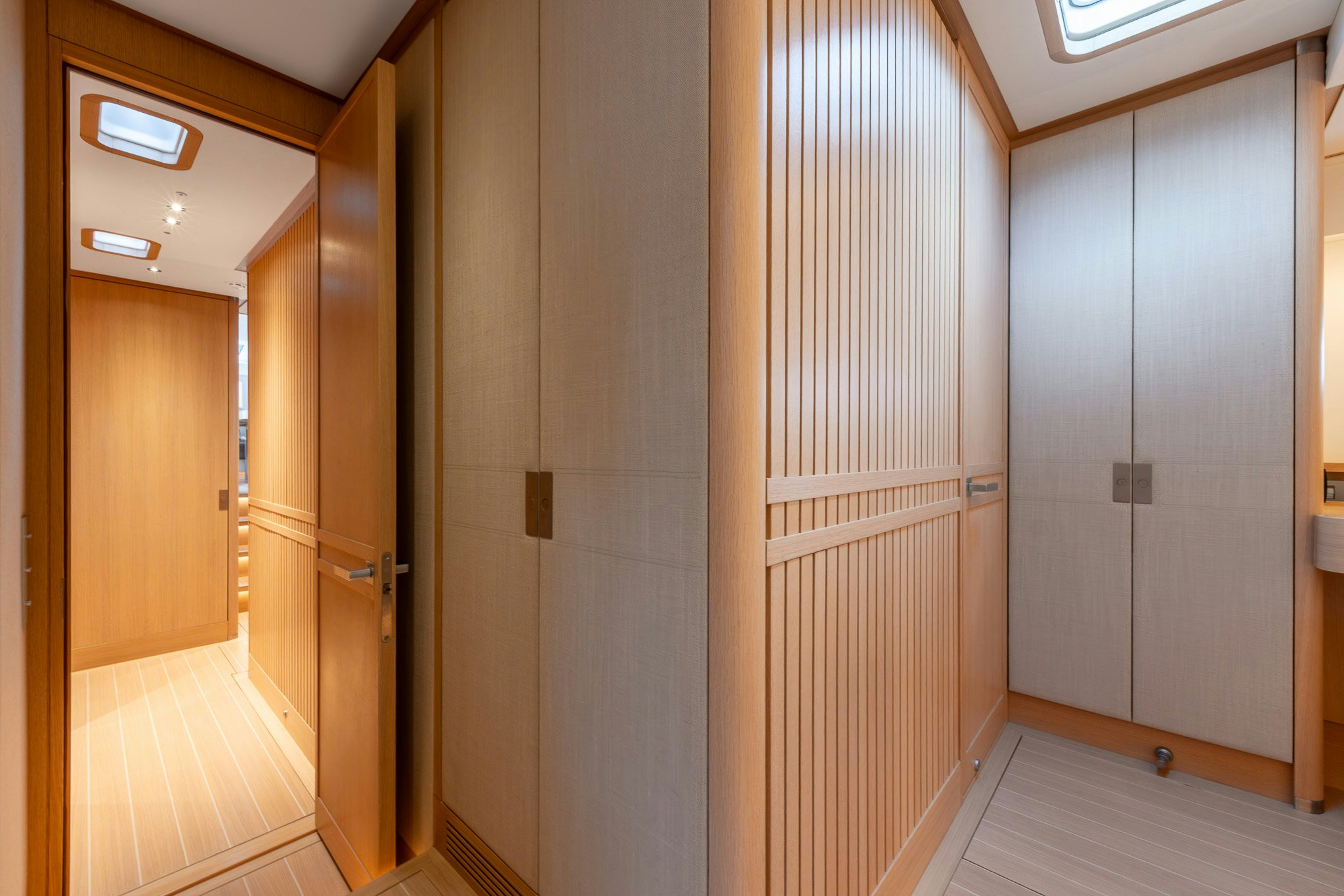 a hallway with doors aboard ALIX Yacht for Sale