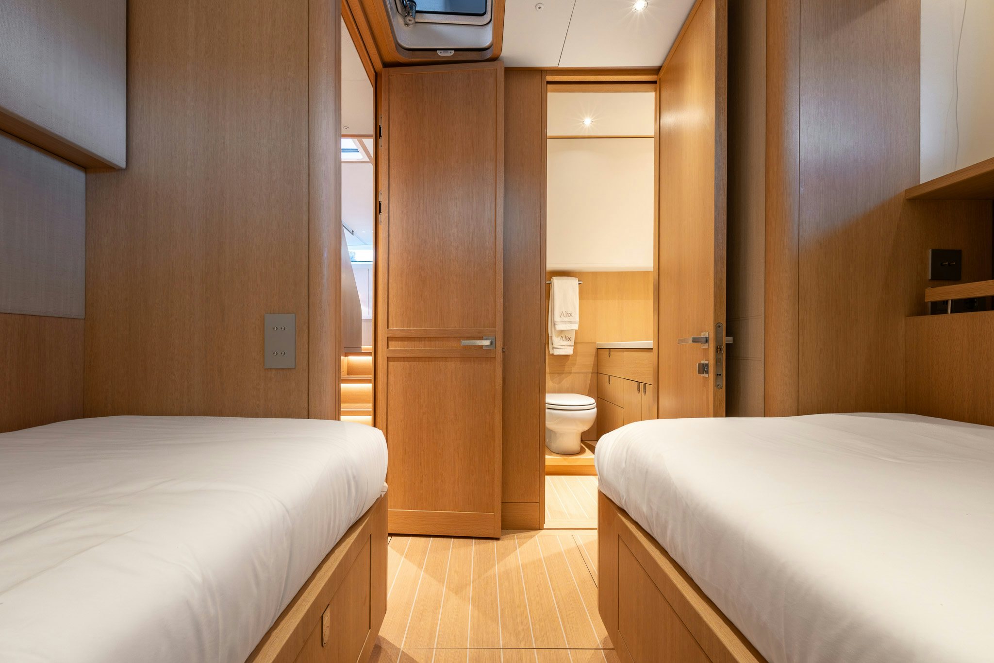a room with a bed and a closet aboard ALIX Yacht for Sale
