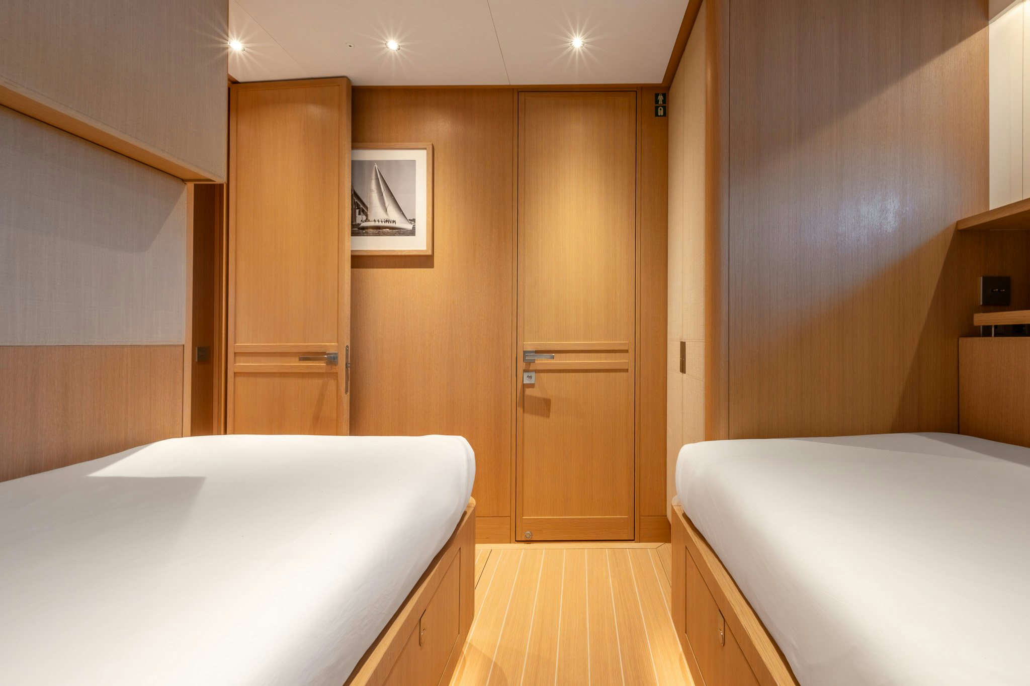a room with a bed and a closet aboard ALIX Yacht for Sale