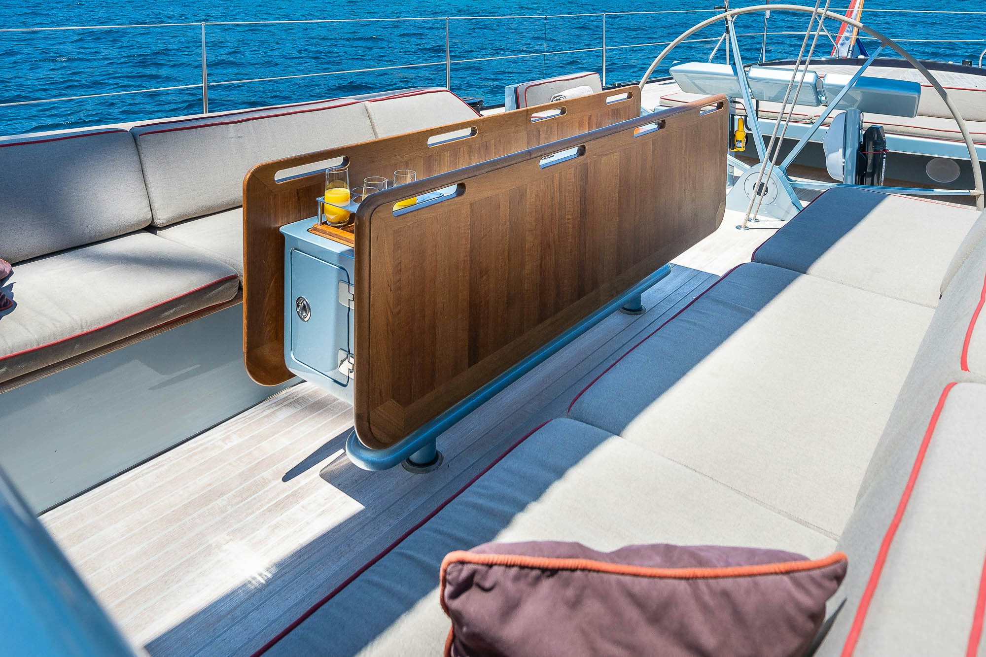 a wooden boat on a deck aboard TULIP Yacht for Sale
