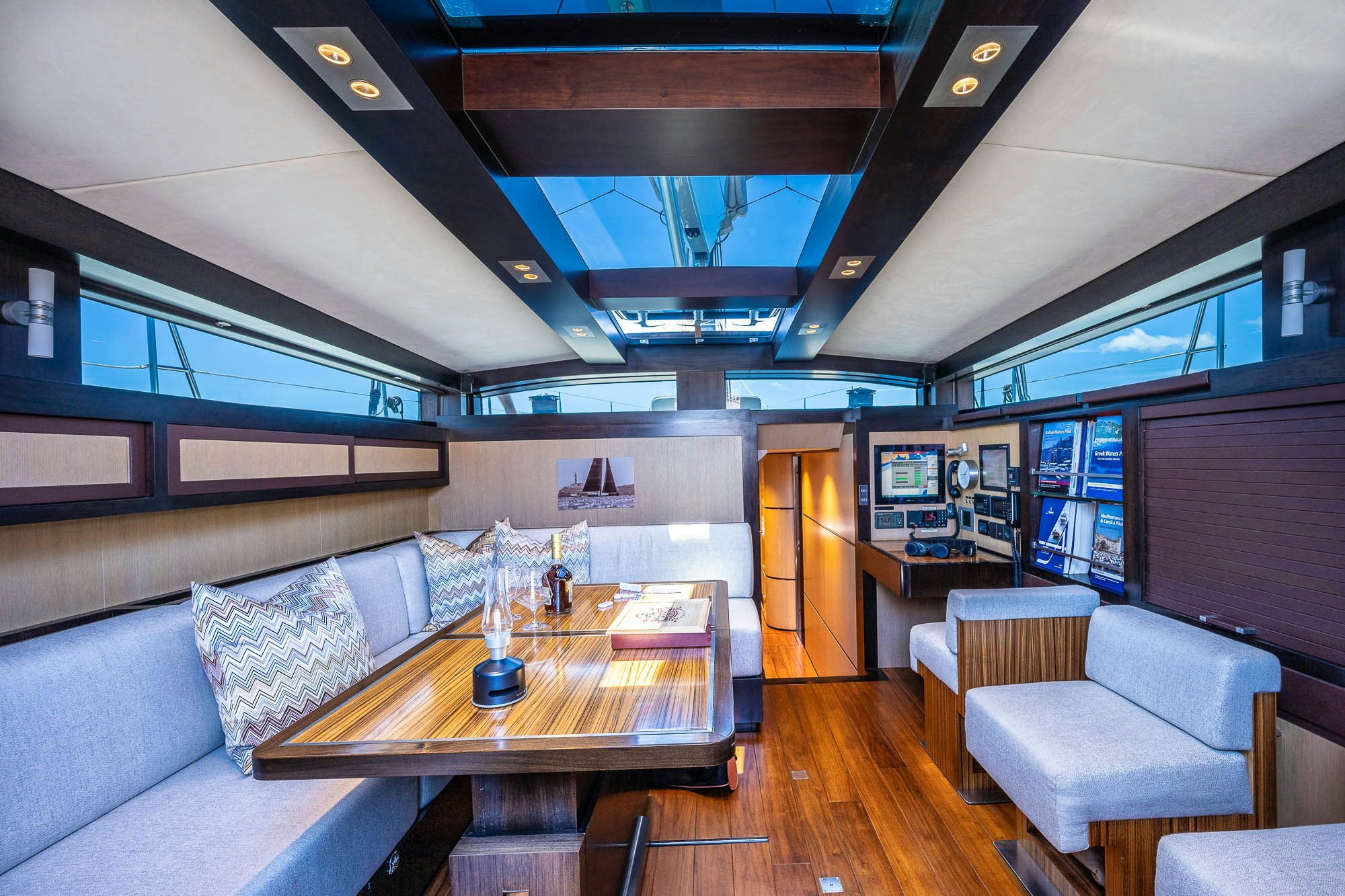 a room with a couch and a table aboard TULIP Yacht for Sale
