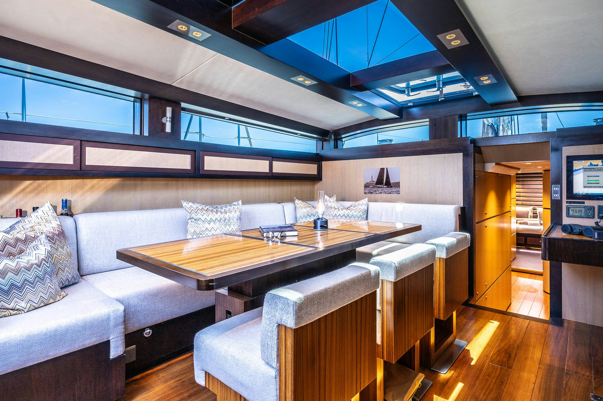 a room with a couch and a table aboard TULIP Yacht for Sale