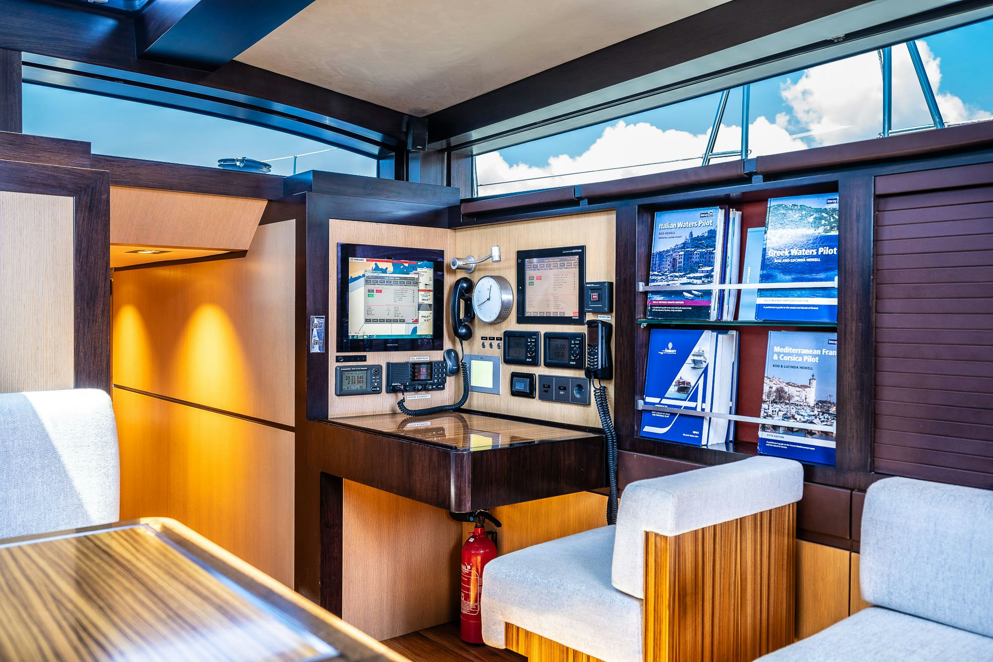 a room with a table and chairs aboard TULIP Yacht for Sale