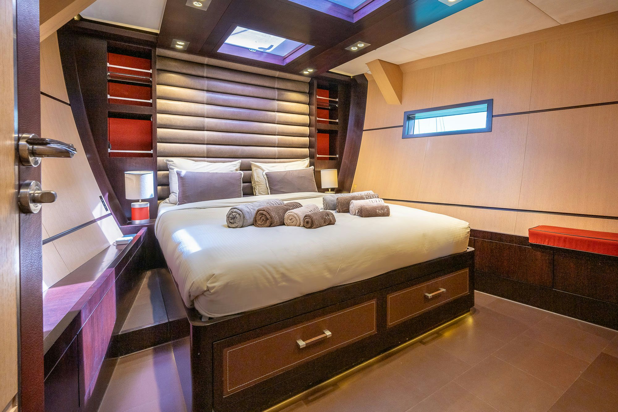 a bed in a room aboard TULIP Yacht for Sale
