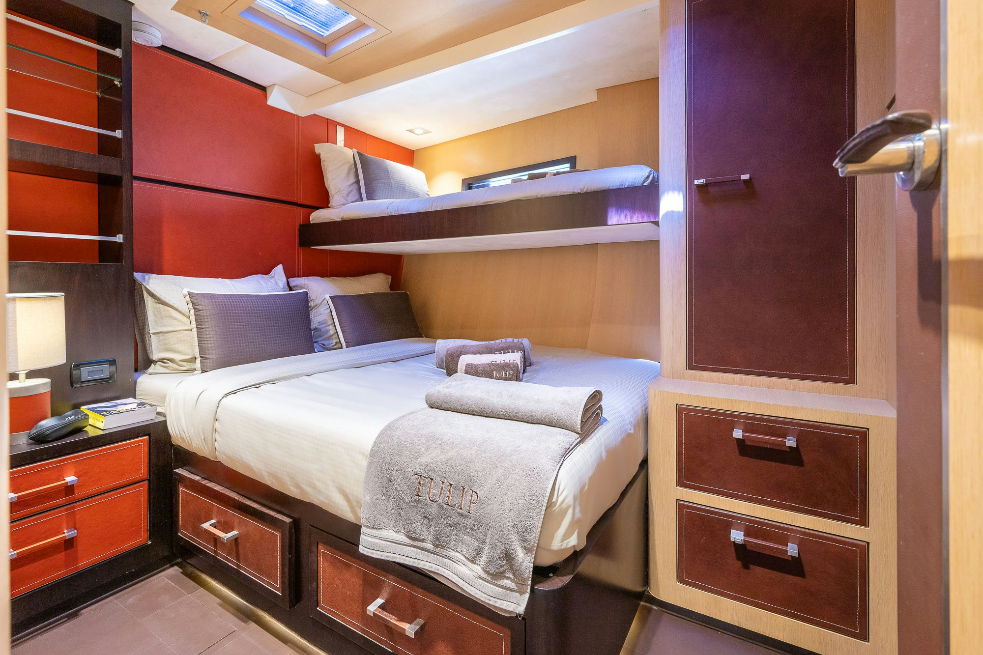 a bed in a room aboard TULIP Yacht for Sale