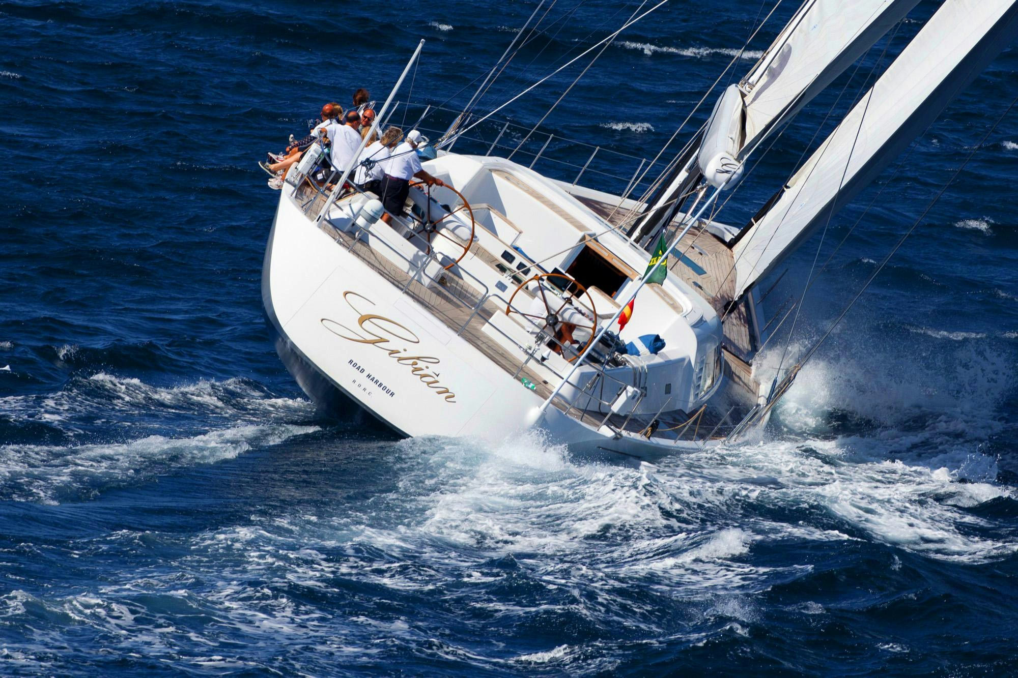 a group of people on a sailboat aboard GIBIAN Yacht for Sale