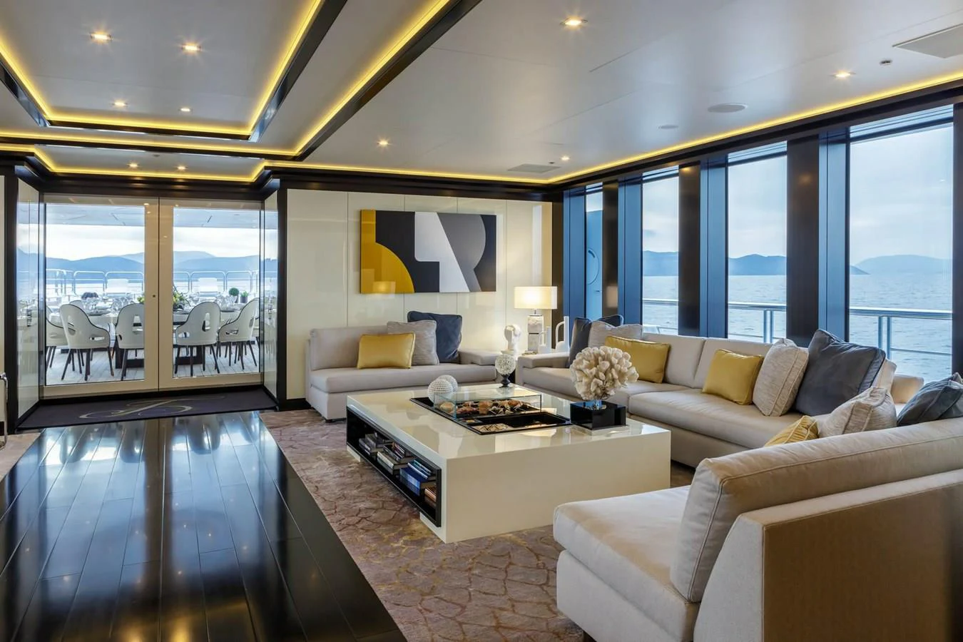 a living room with a large window aboard SAPPHIRE Yacht for Charter