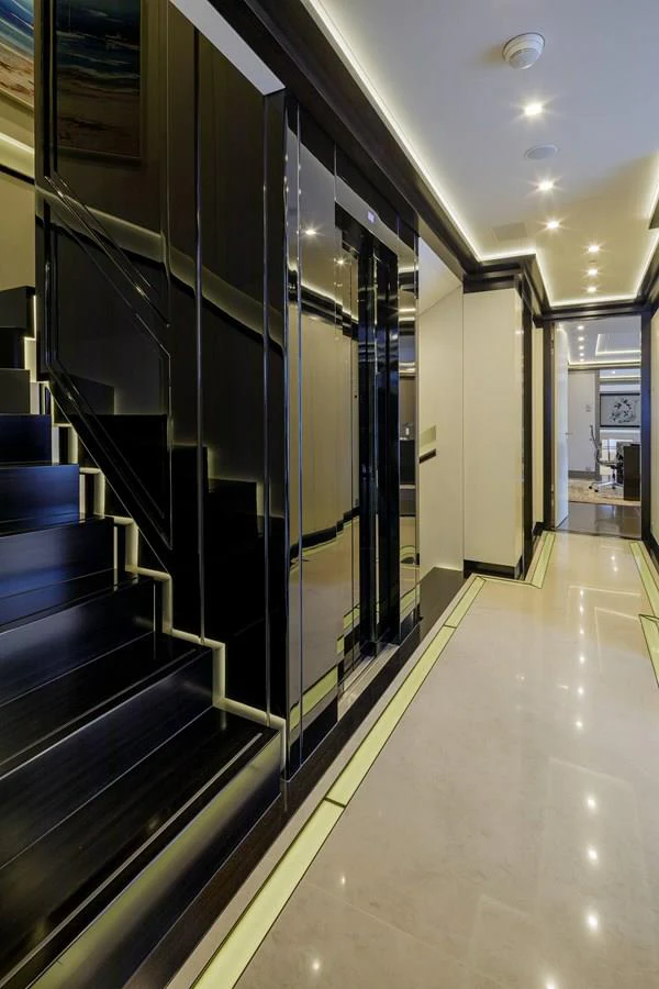 a hallway with glass doors aboard SAPPHIRE Yacht for Charter