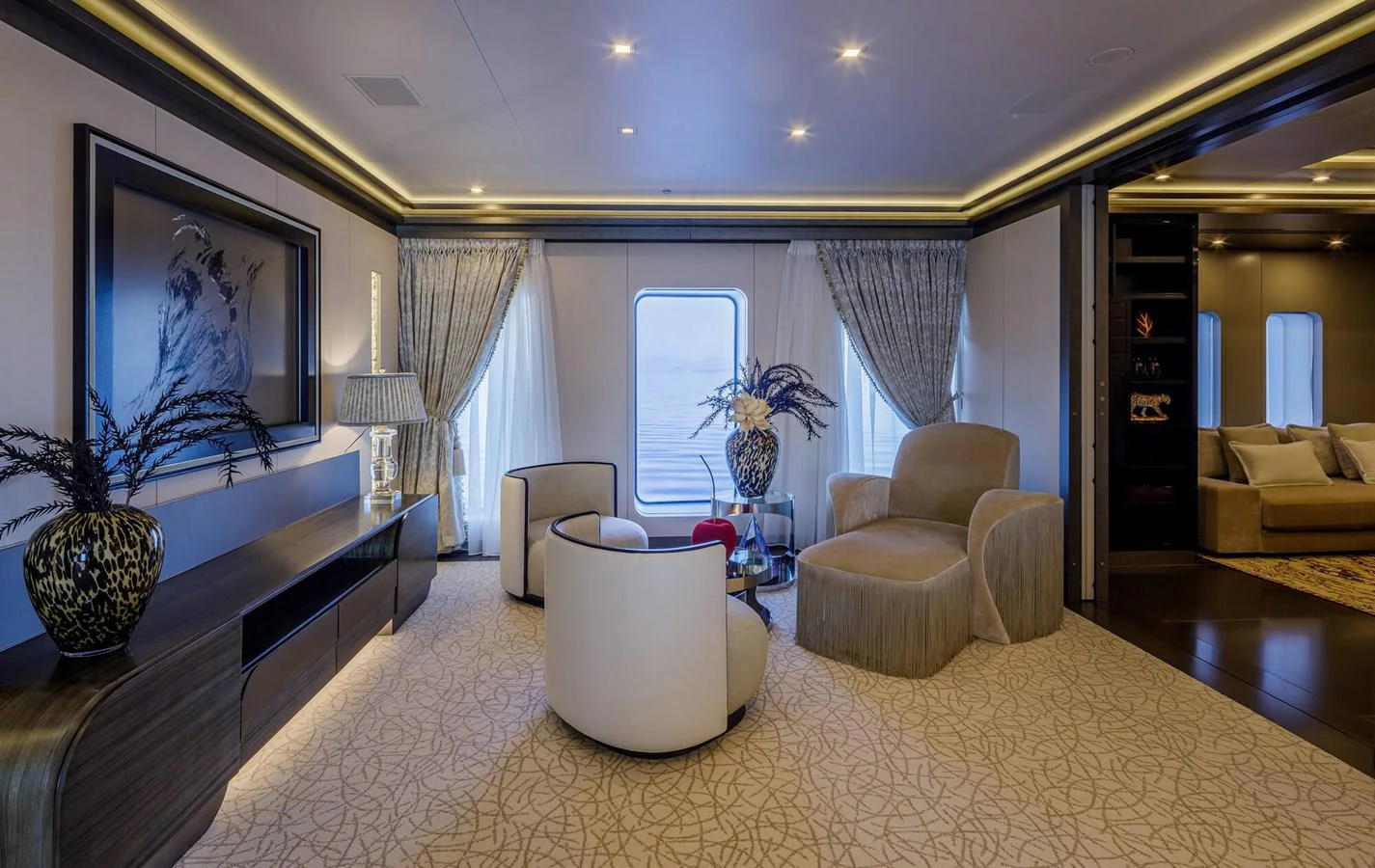 a large living room with a large screen aboard SAPPHIRE Yacht for Charter