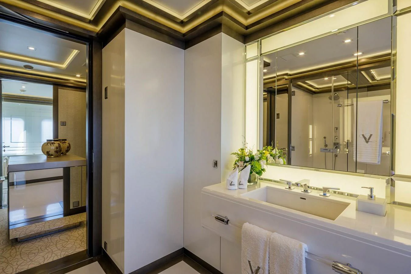 a bathroom with a large mirror aboard SAPPHIRE Yacht for Charter
