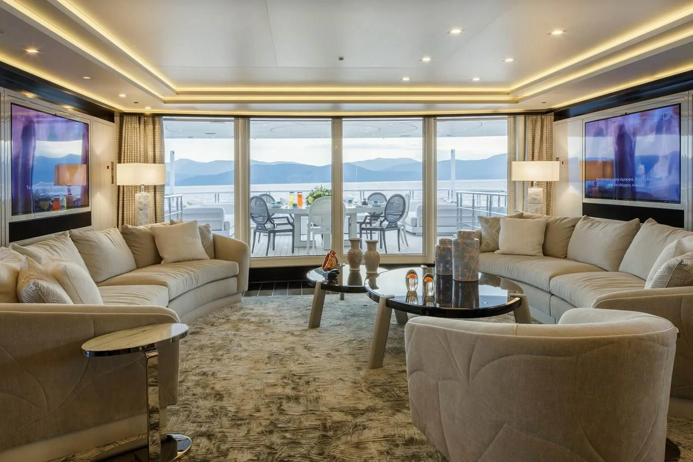 a living room with a large window aboard SAPPHIRE Yacht for Charter