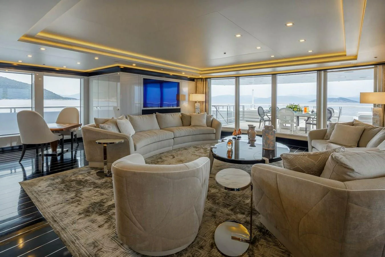 a living room with a large window aboard SAPPHIRE Yacht for Charter