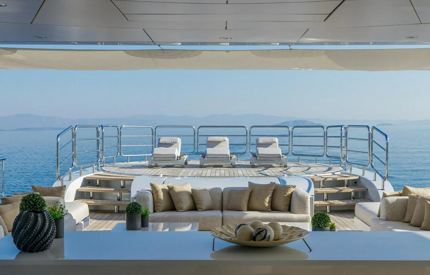 a living room with a couch and a pool aboard SAPPHIRE Yacht for Charter