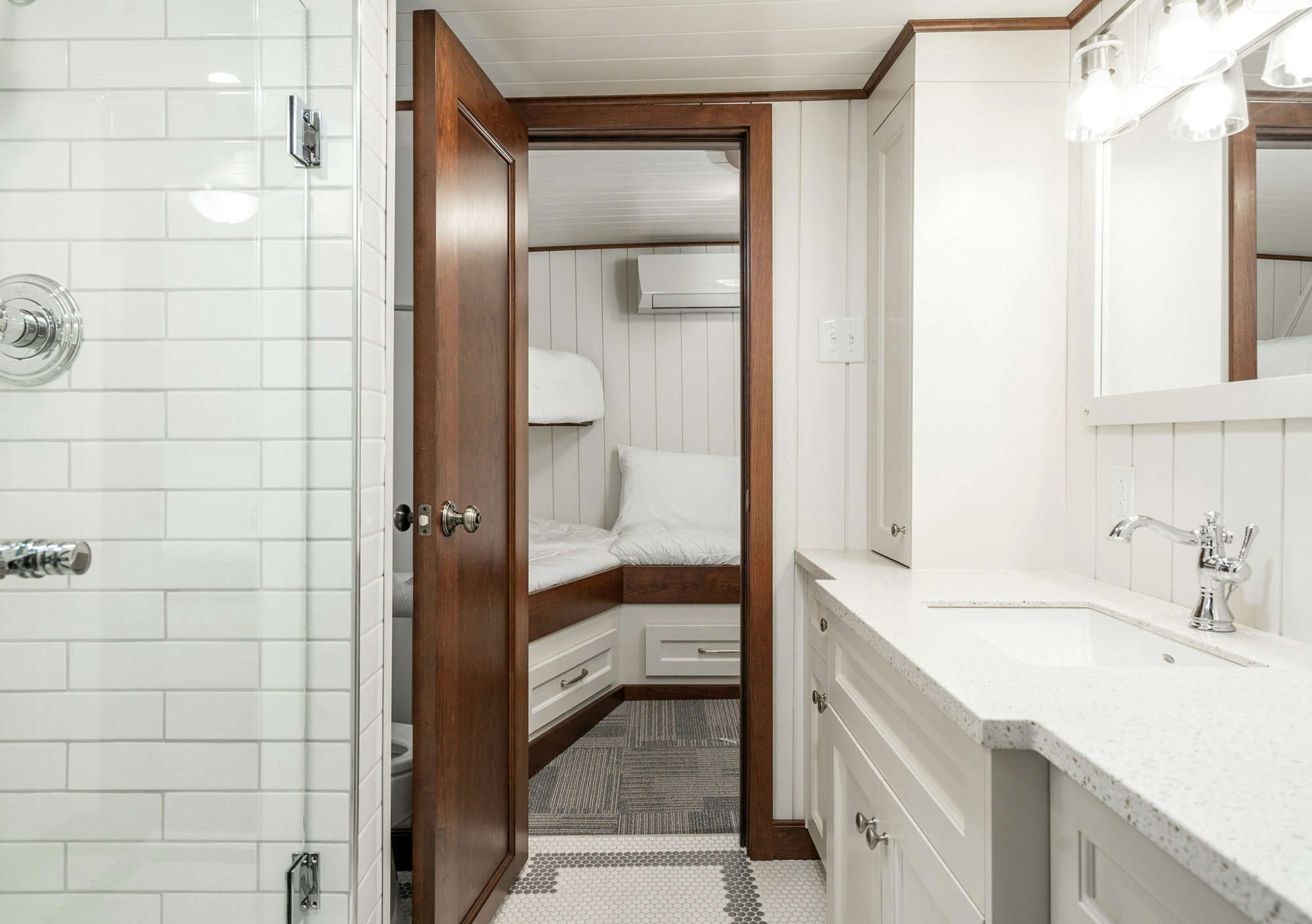 a bathroom with a sink and a mirror aboard ANNE S PIERCE Yacht for Sale