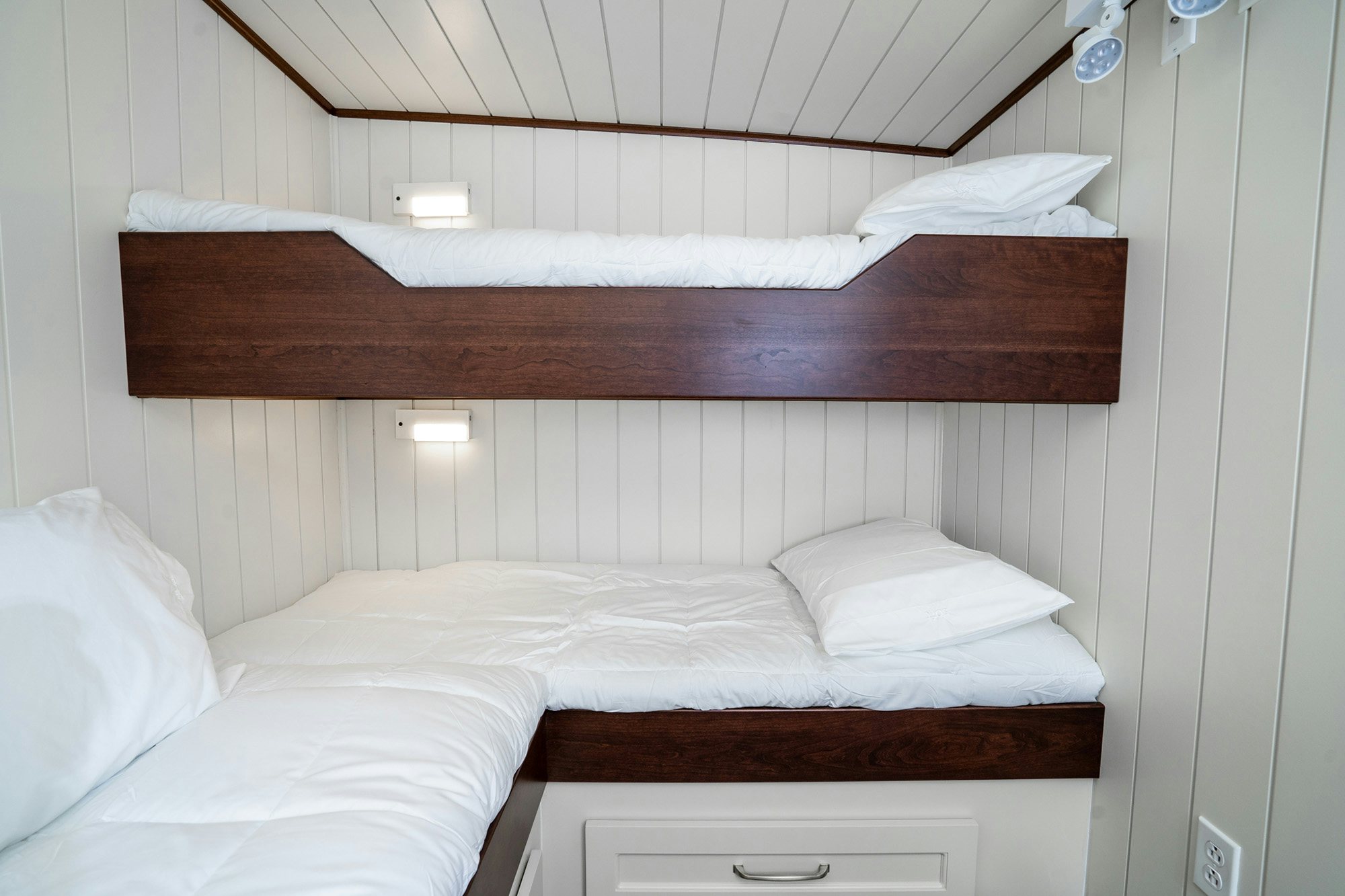 a bed with white sheets aboard ANNE S PIERCE Yacht for Sale