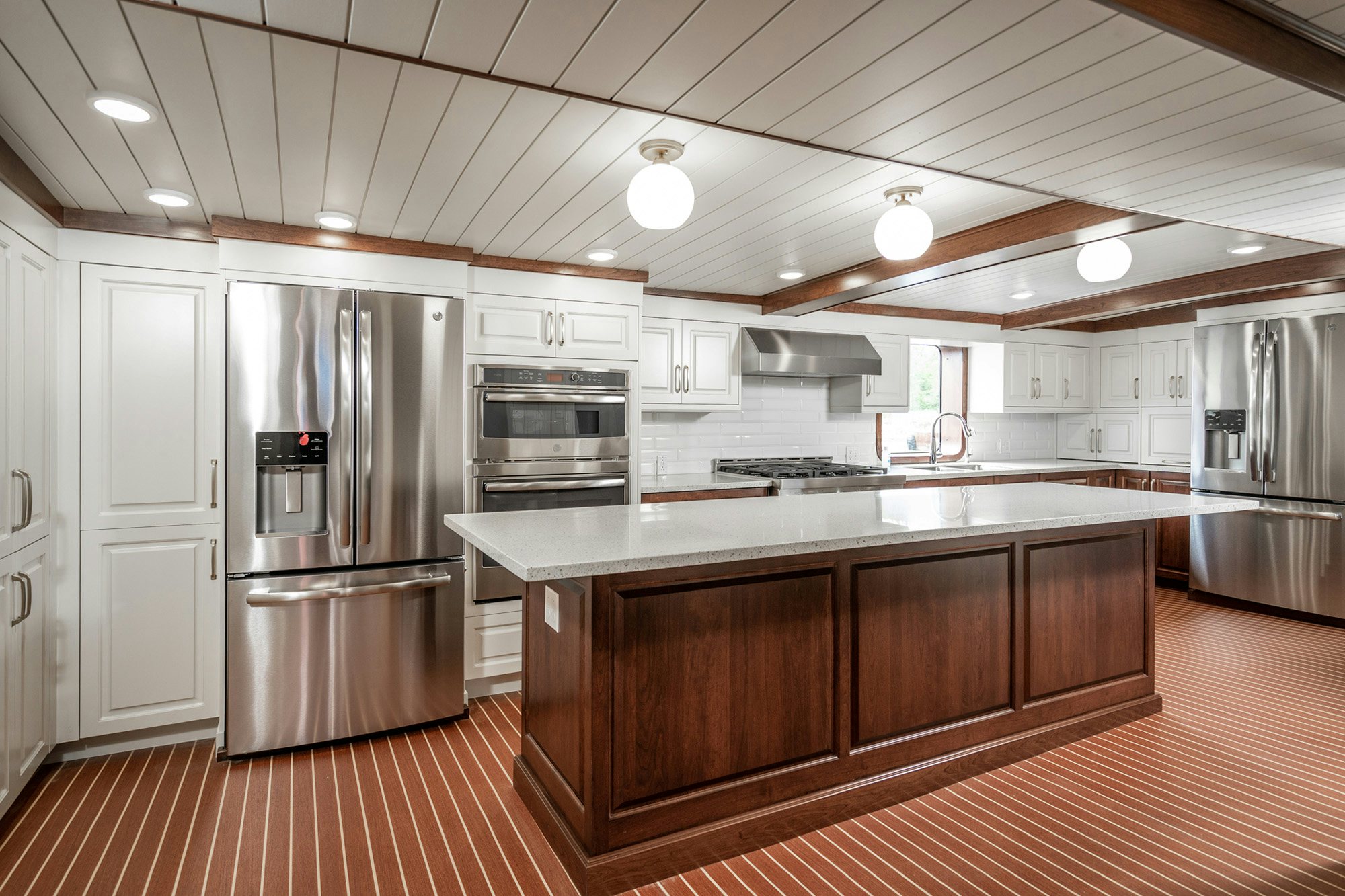 a large kitchen with stainless steel appliances aboard ANNE S PIERCE Yacht for Sale