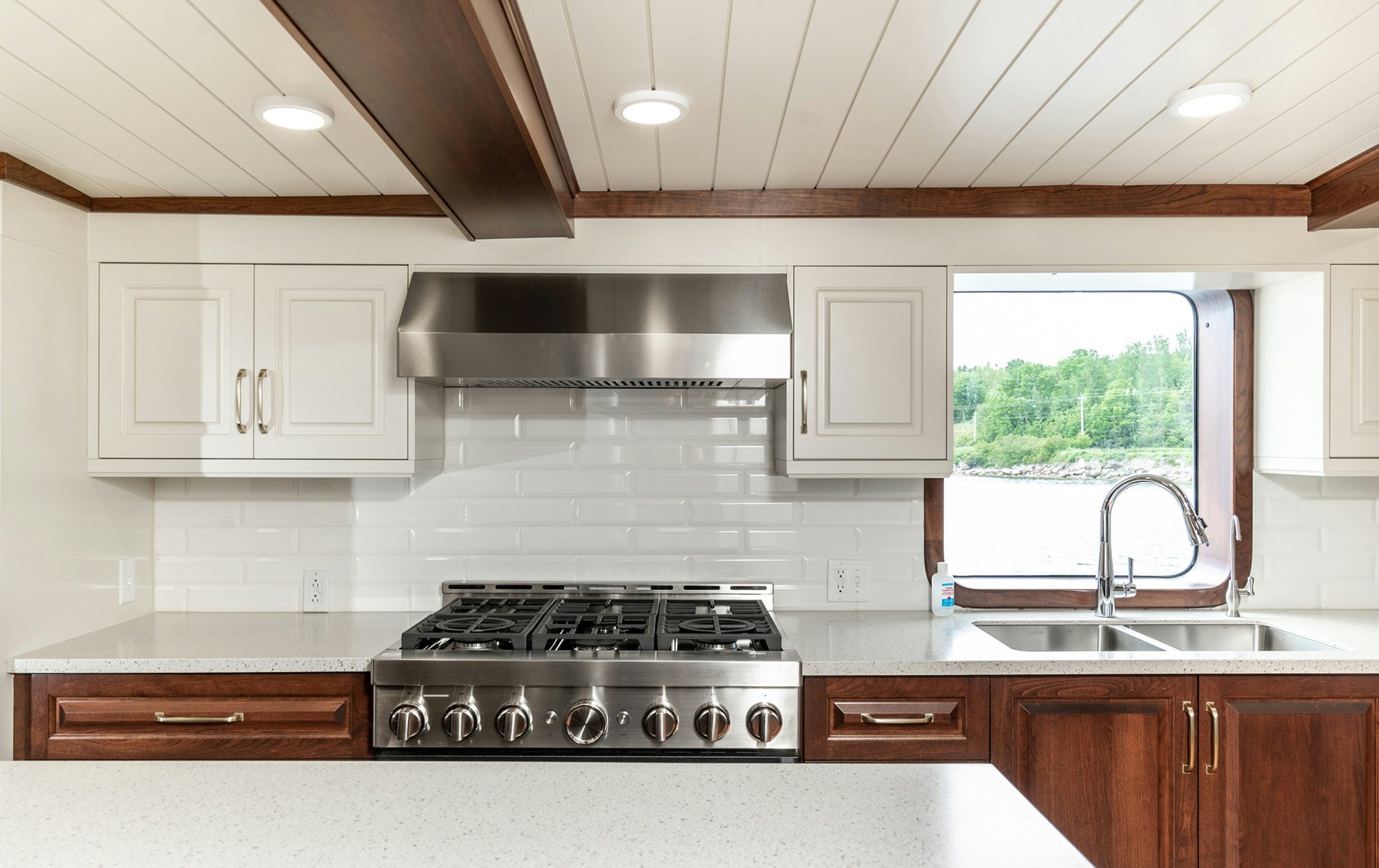 a kitchen with a stove and sink aboard ANNE S PIERCE Yacht for Sale
