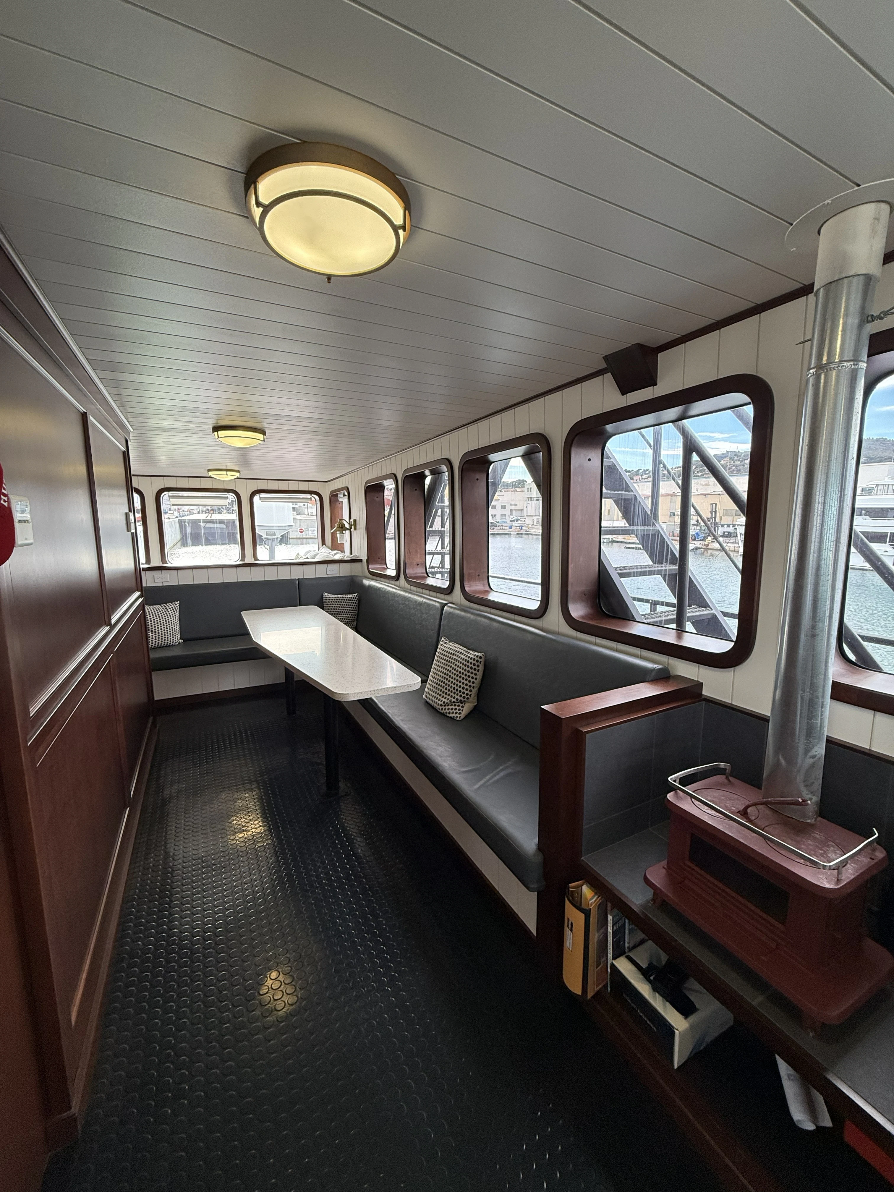 a train with wooden seats aboard ANNE S PIERCE Yacht for Sale