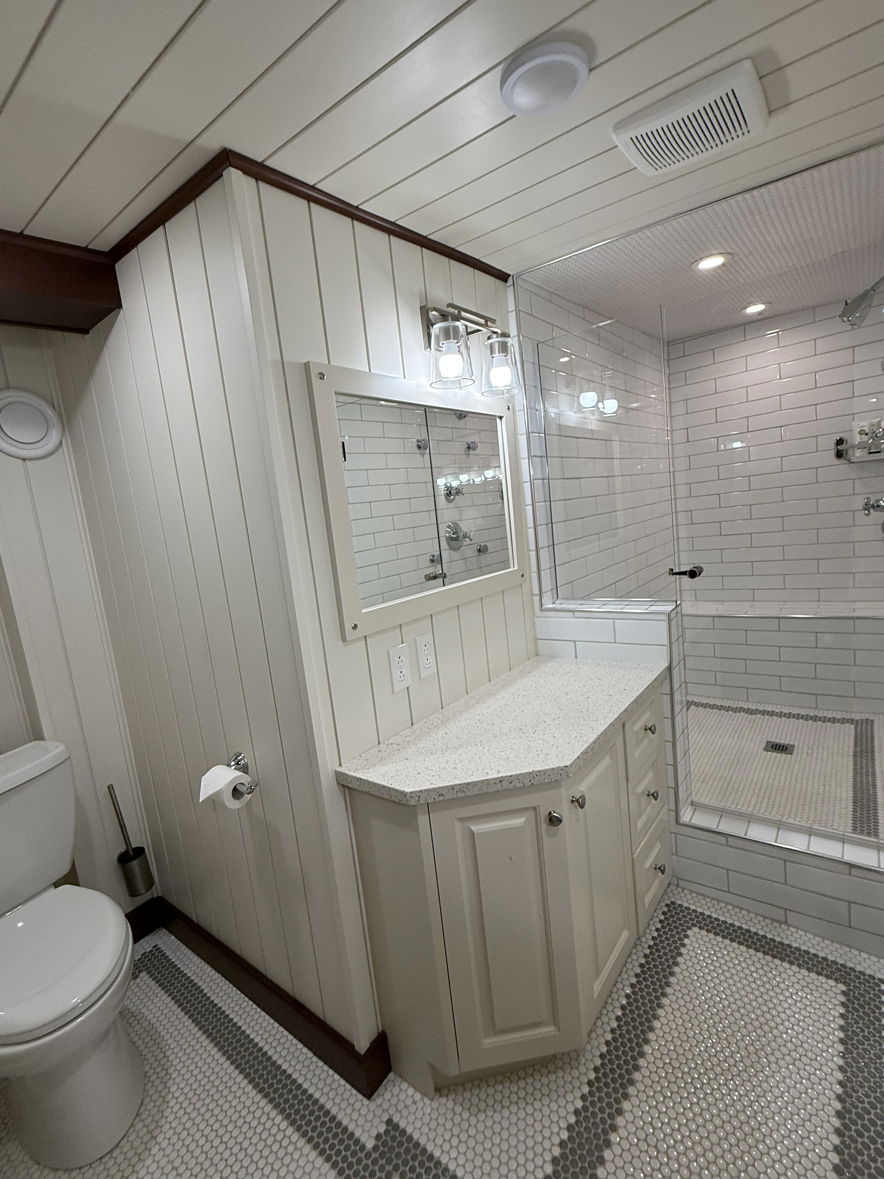 a bathroom with a toilet and a sink aboard ANNE S PIERCE Yacht for Sale