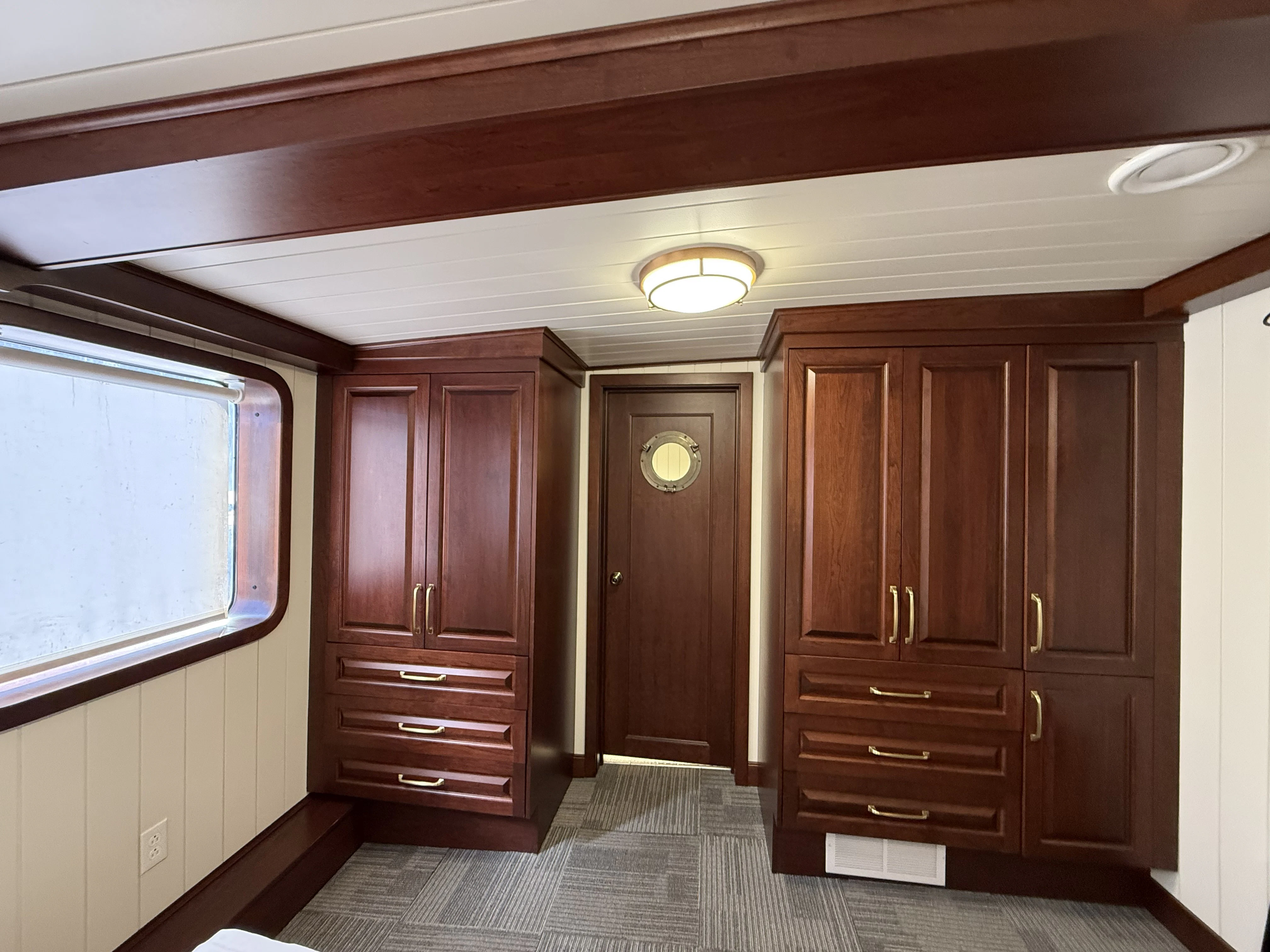 a room with wooden cabinets aboard ANNE S PIERCE Yacht for Sale