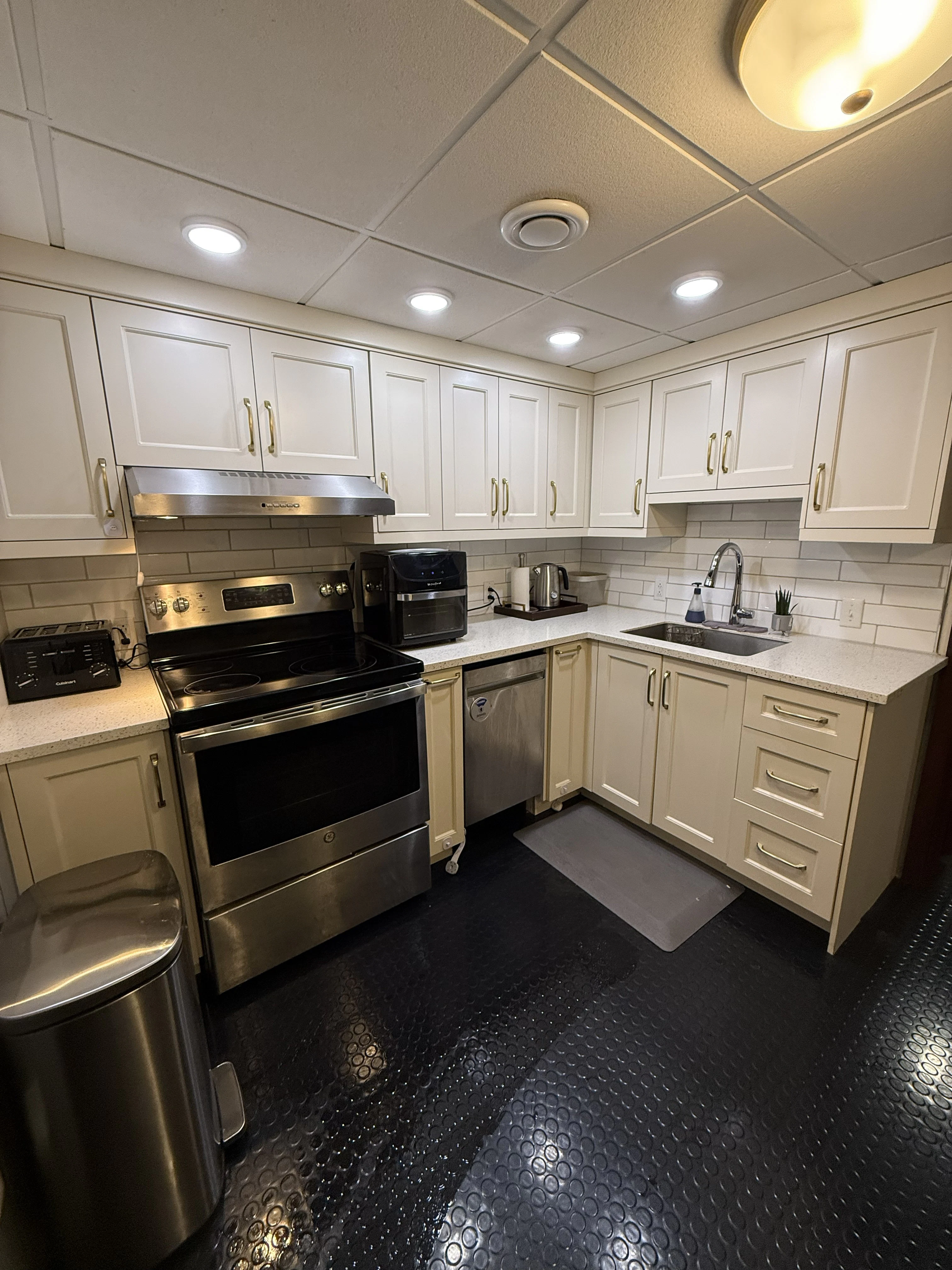 a kitchen with white cabinets aboard ANNE S PIERCE Yacht for Sale