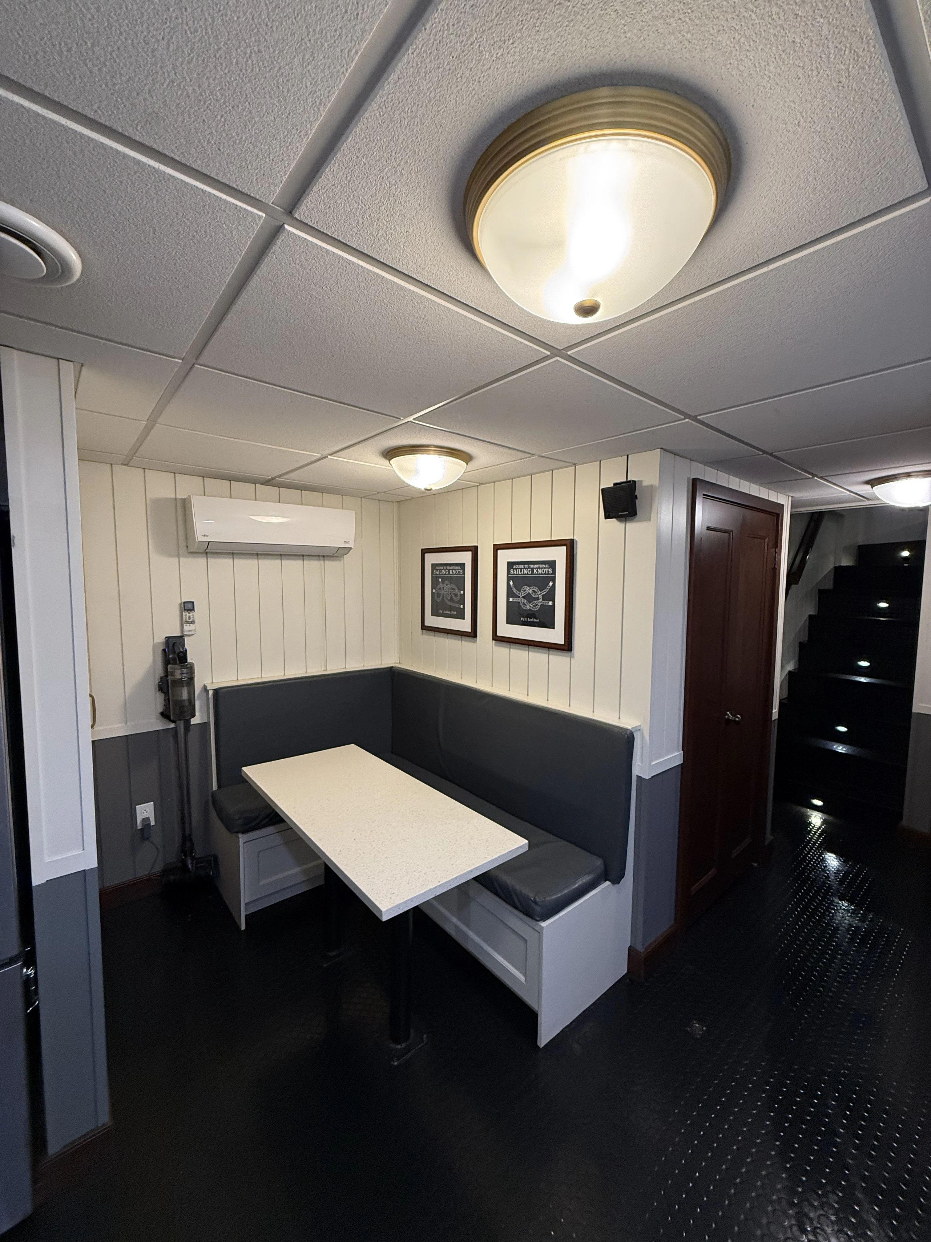 a room with a table and chairs aboard ANNE S PIERCE Yacht for Sale