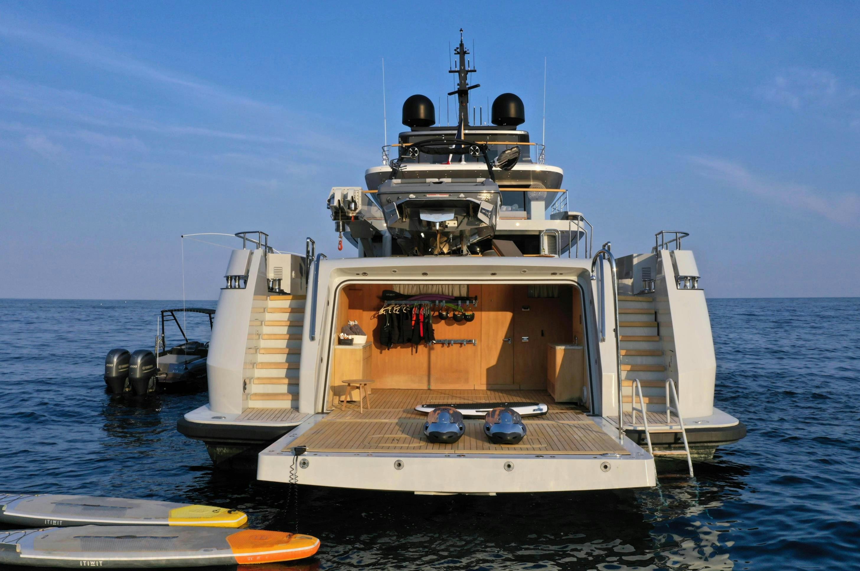 a large white boat in the water aboard X Yacht for Sale