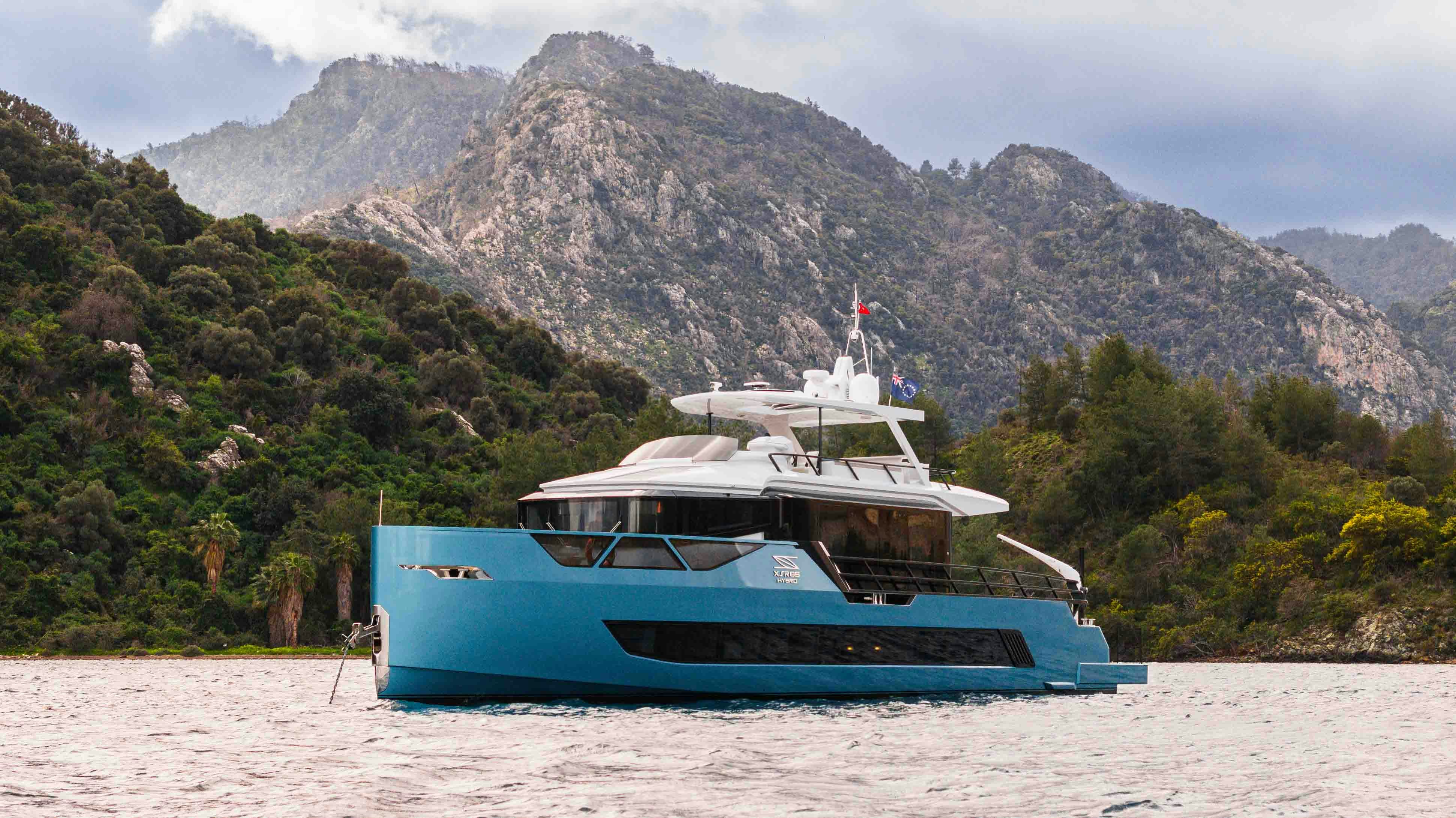 a boat on a beach aboard NB 202 Yacht for Sale