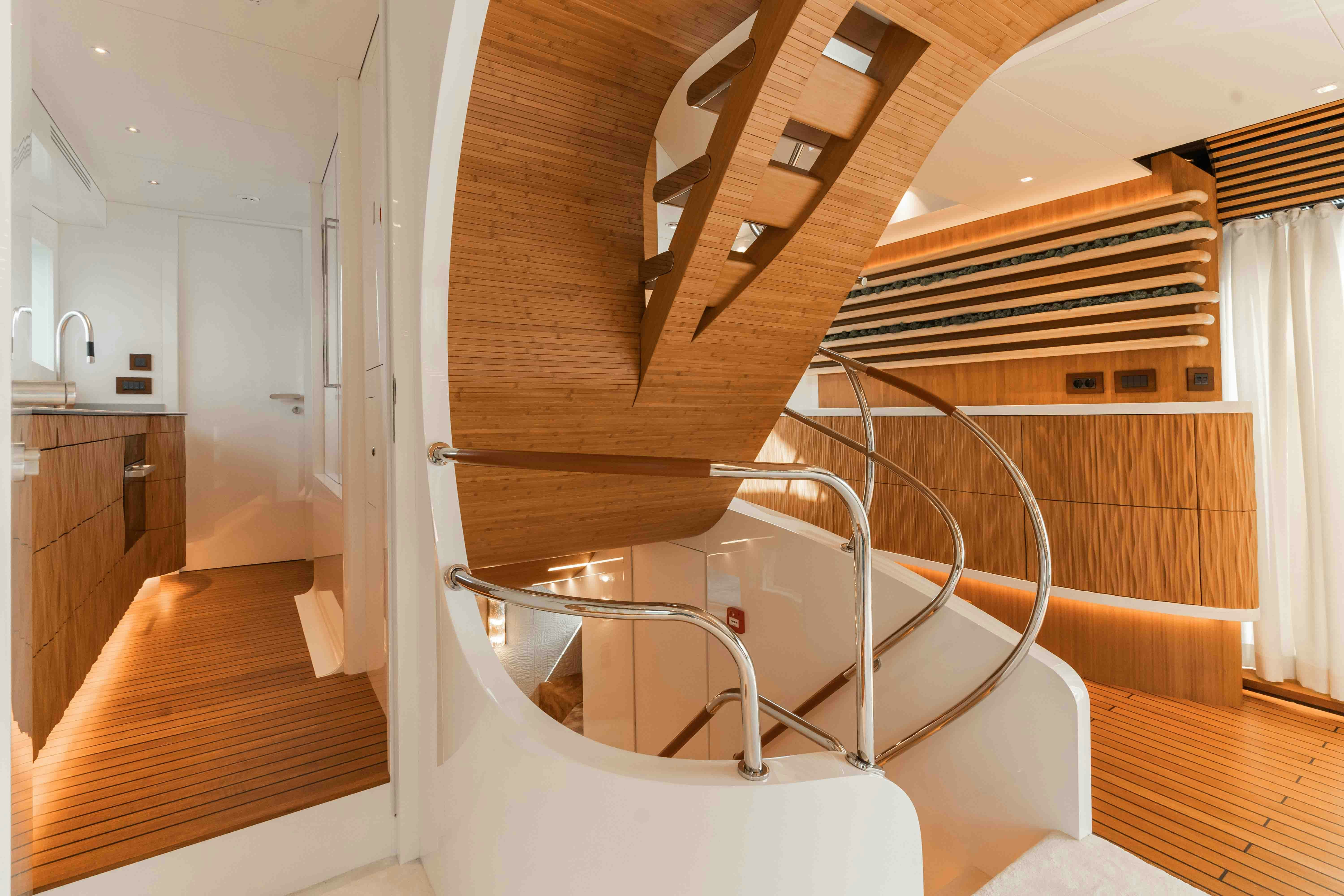 a wooden staircase in a house aboard NB 202 Yacht for Sale