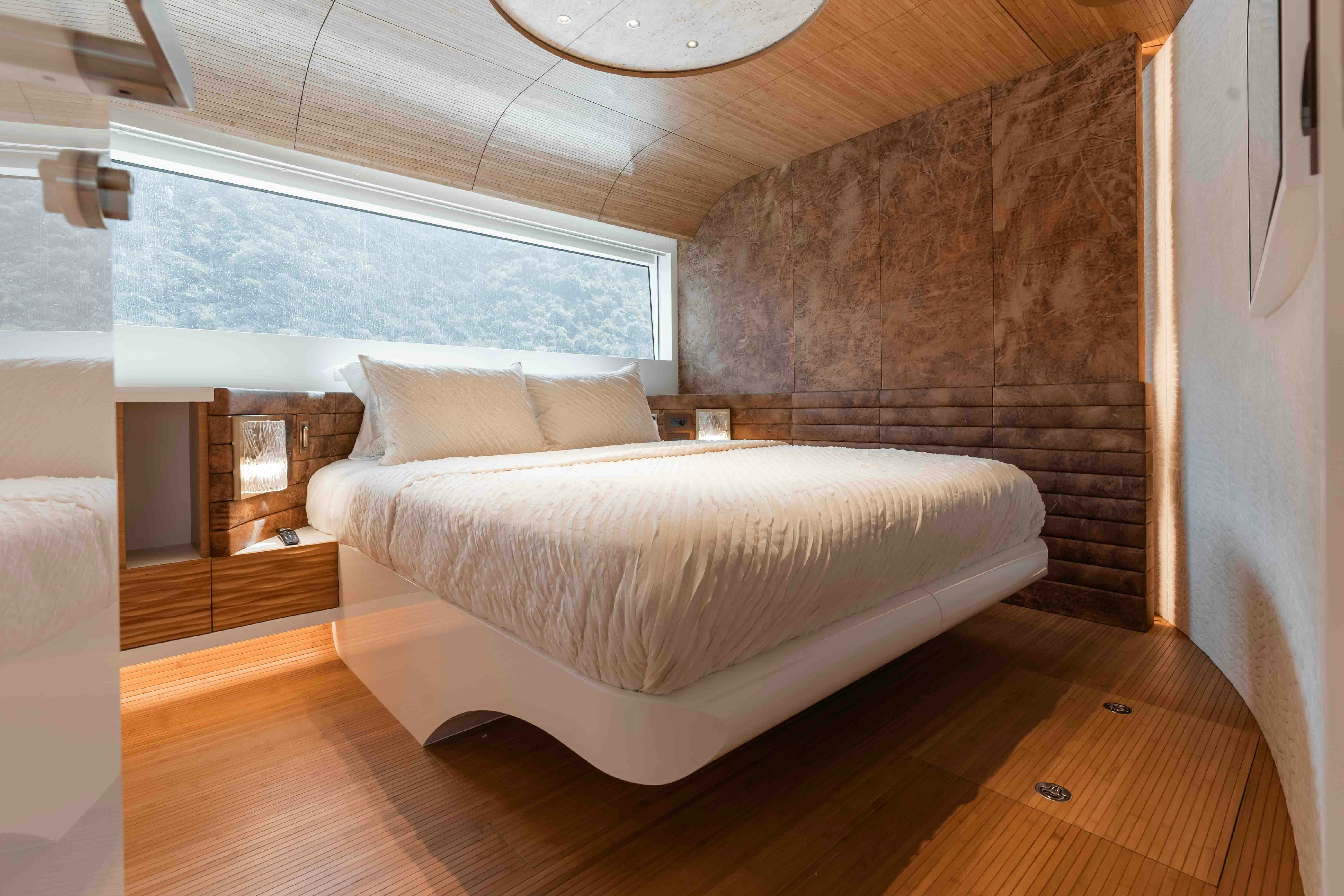 a bed in a room aboard NB 202 Yacht for Sale