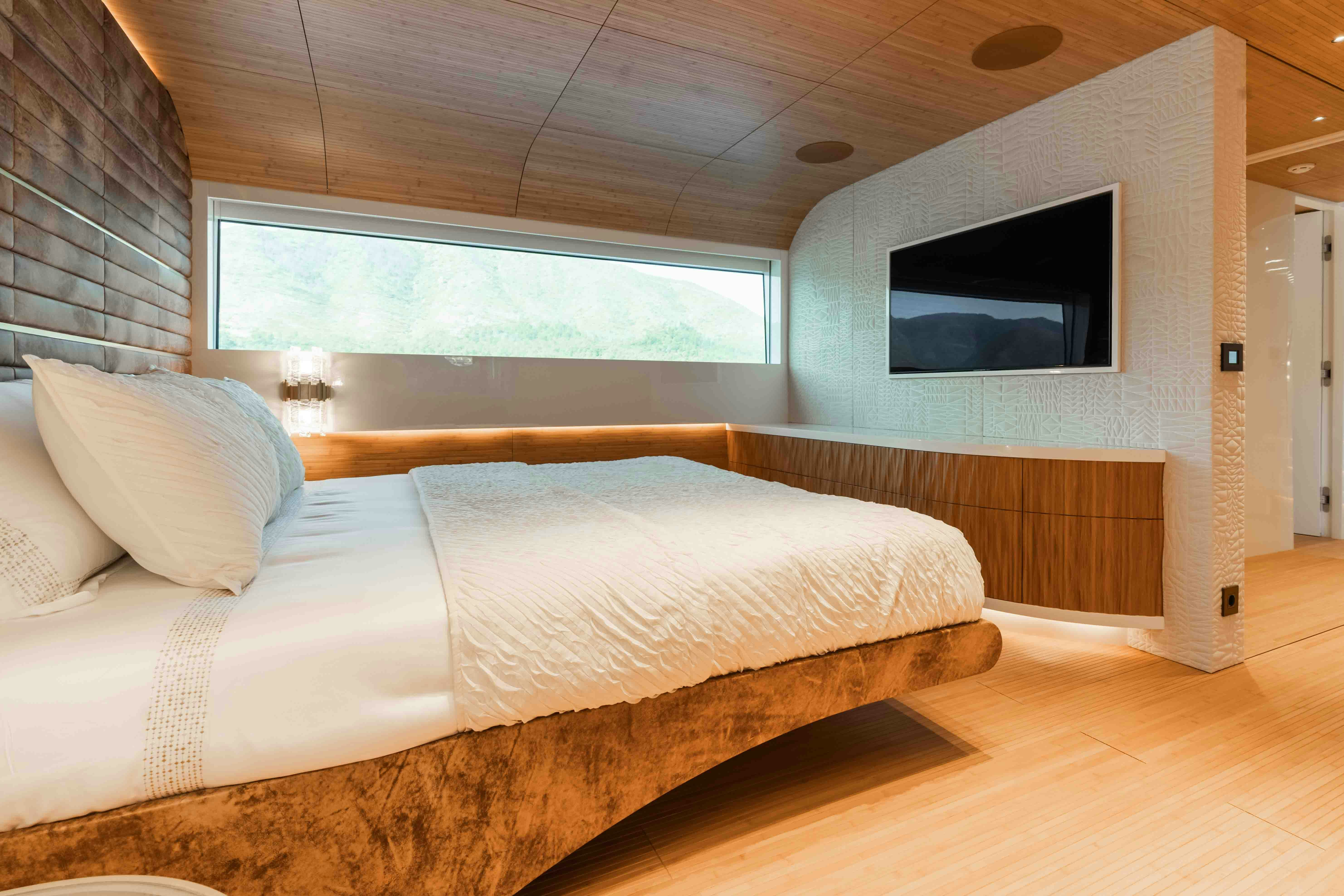 a bed in a room aboard NB 202 Yacht for Sale