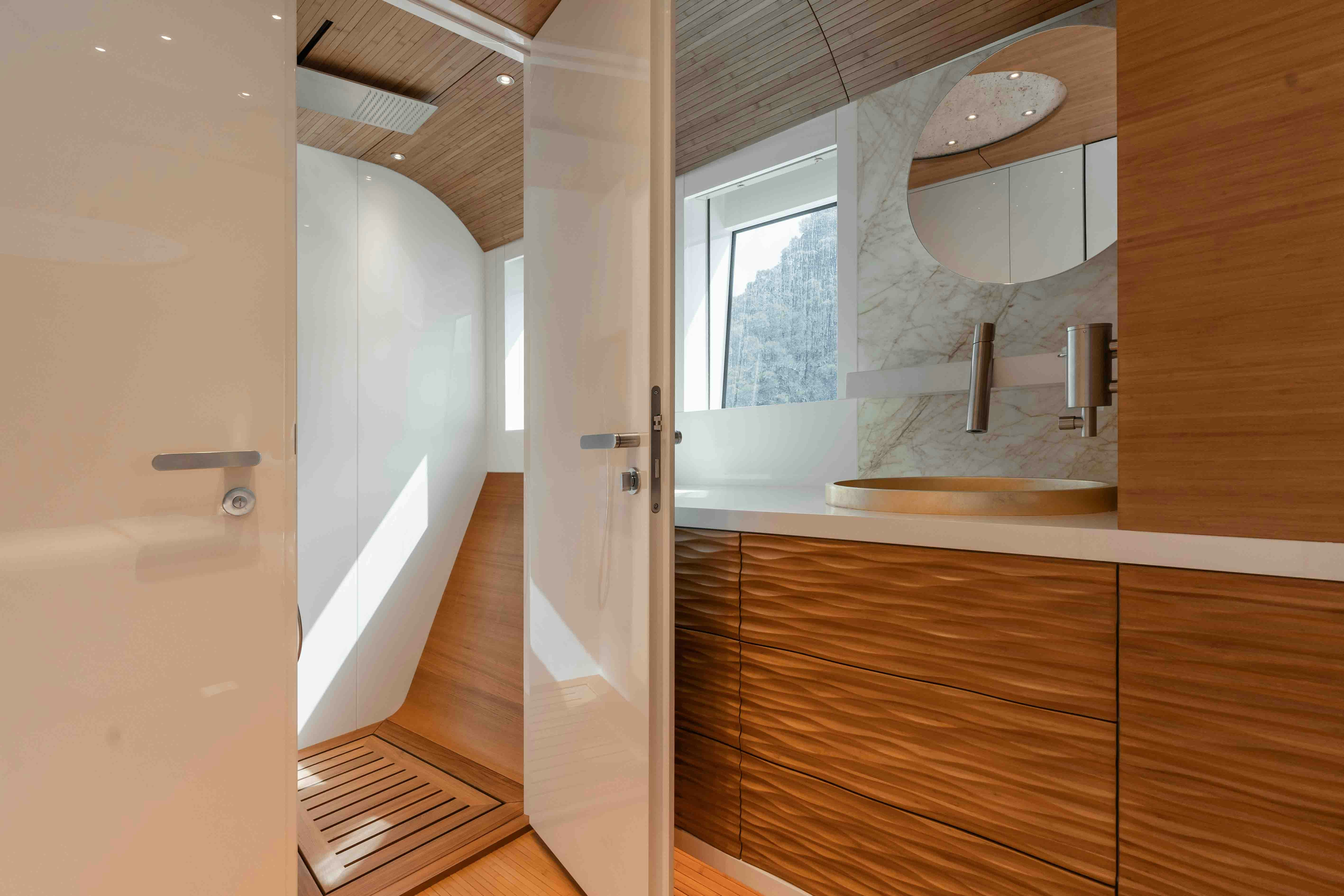 a bathroom with a large mirror aboard NB 202 Yacht for Sale