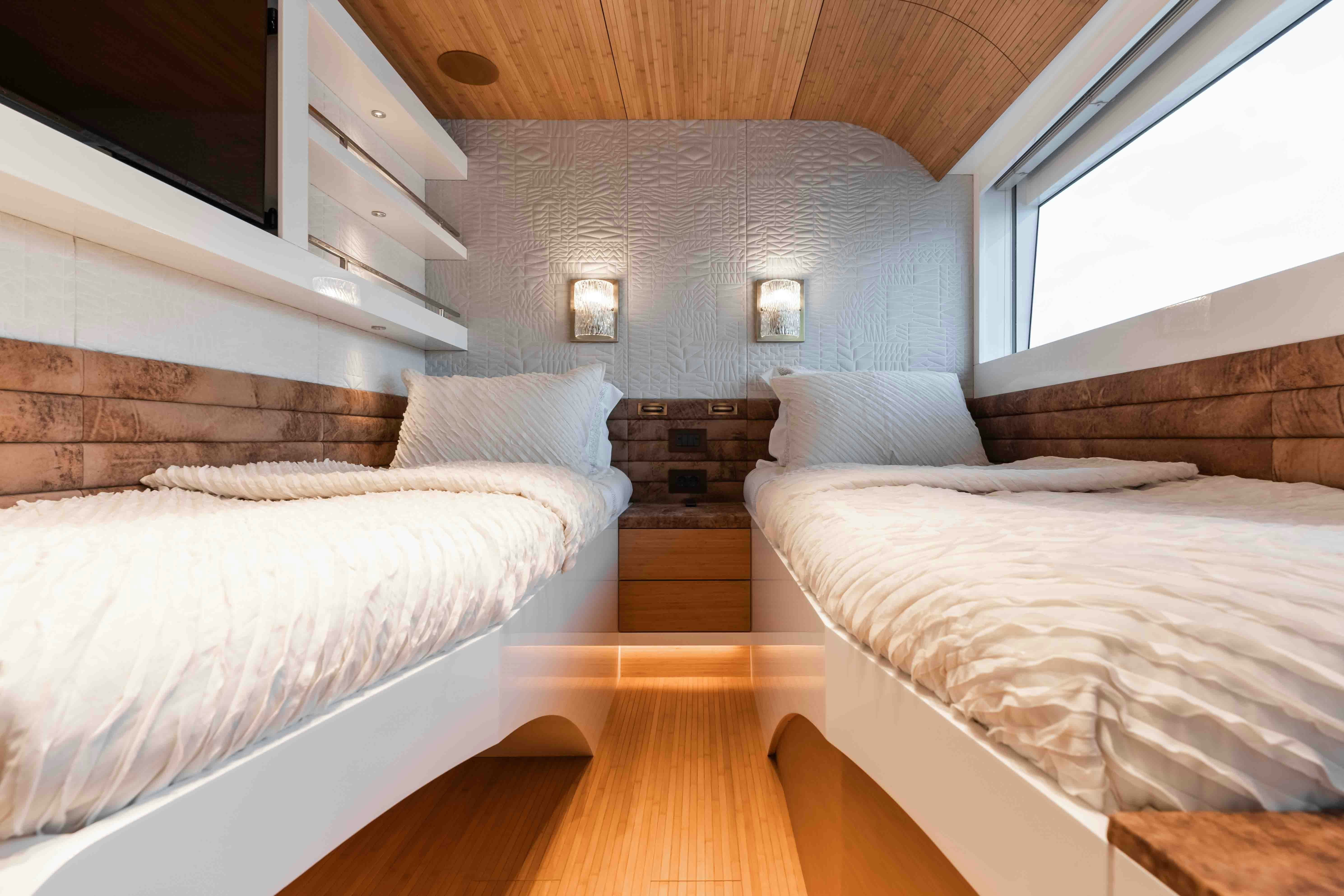 a room with two beds aboard NB 202 Yacht for Sale