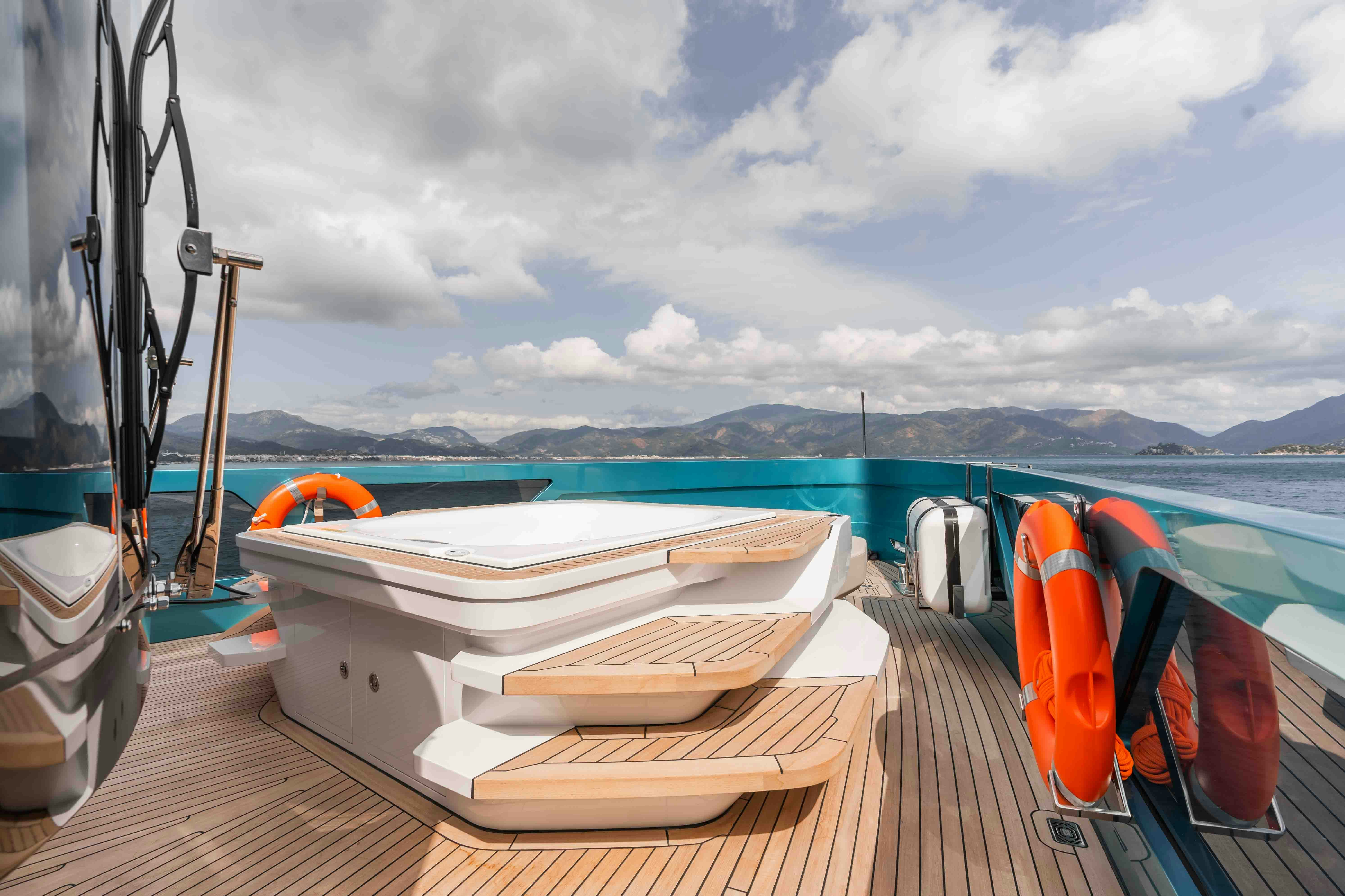 a boat on a deck aboard NB 202 Yacht for Sale